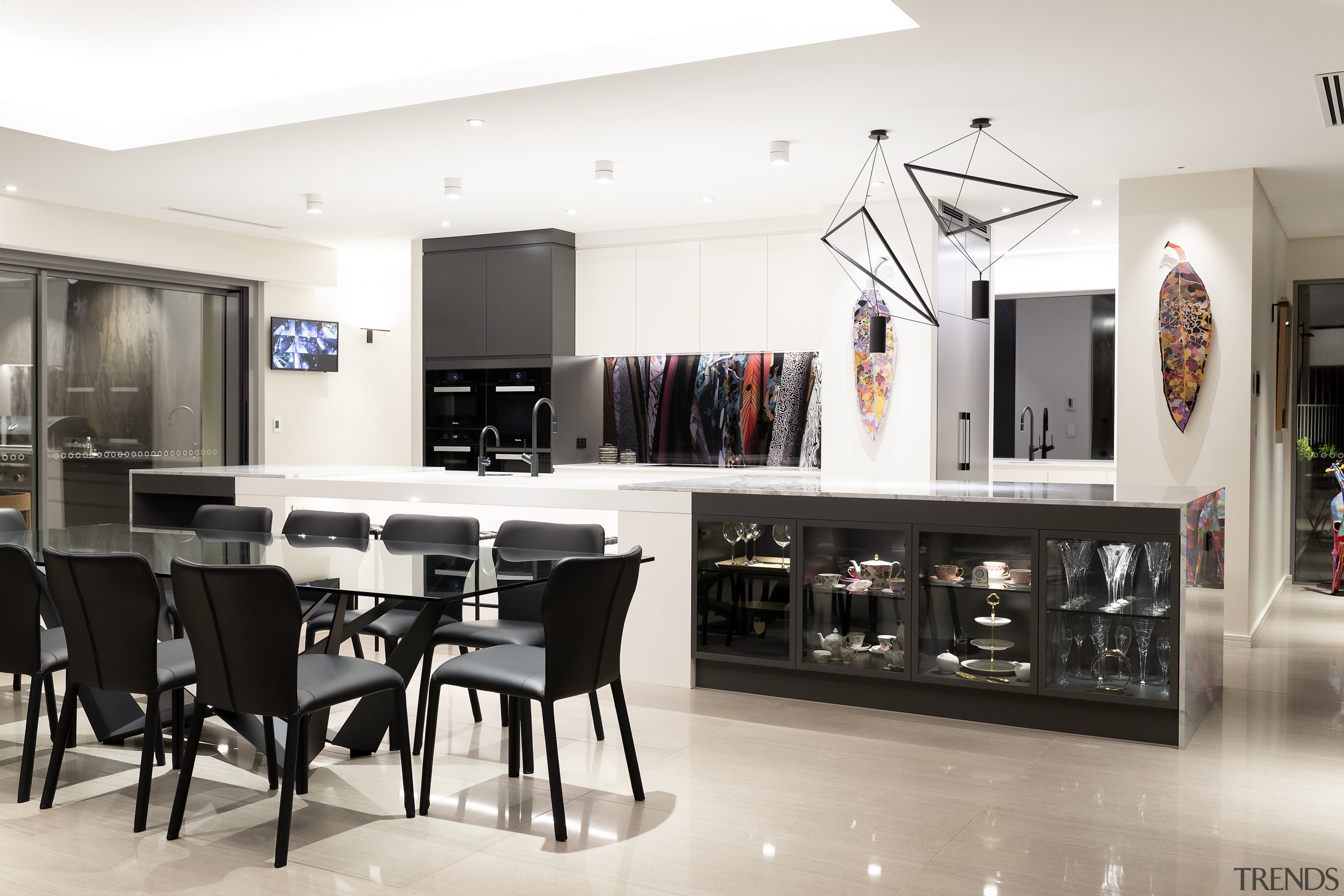 Natural white marble used in the kitchen contrasts 