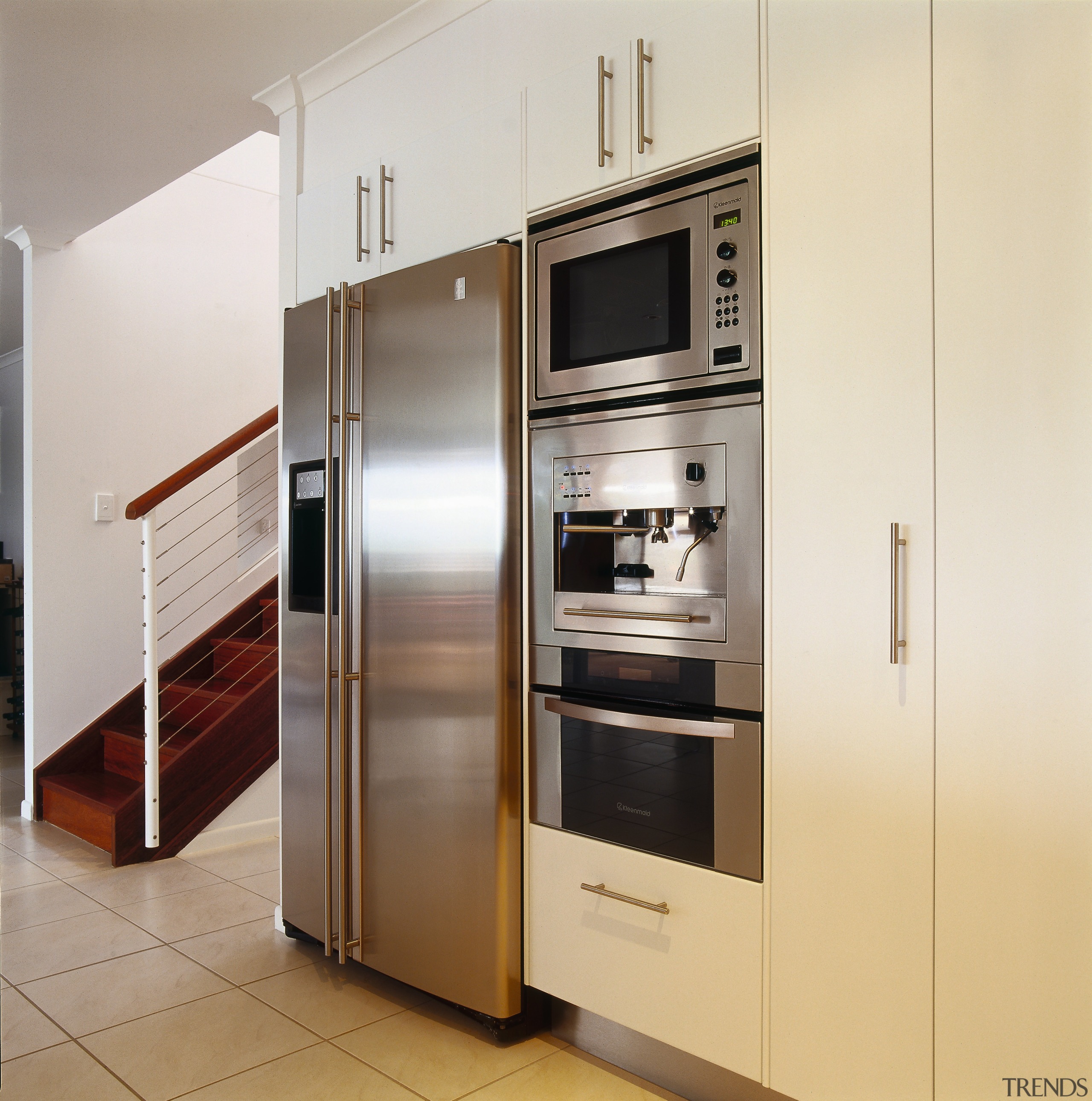 view of this kitchen featuring kleenmaid fridge,oven, microwave countertop, home appliance, kitchen, kitchen appliance, kitchen stove, major appliance, refrigerator, white