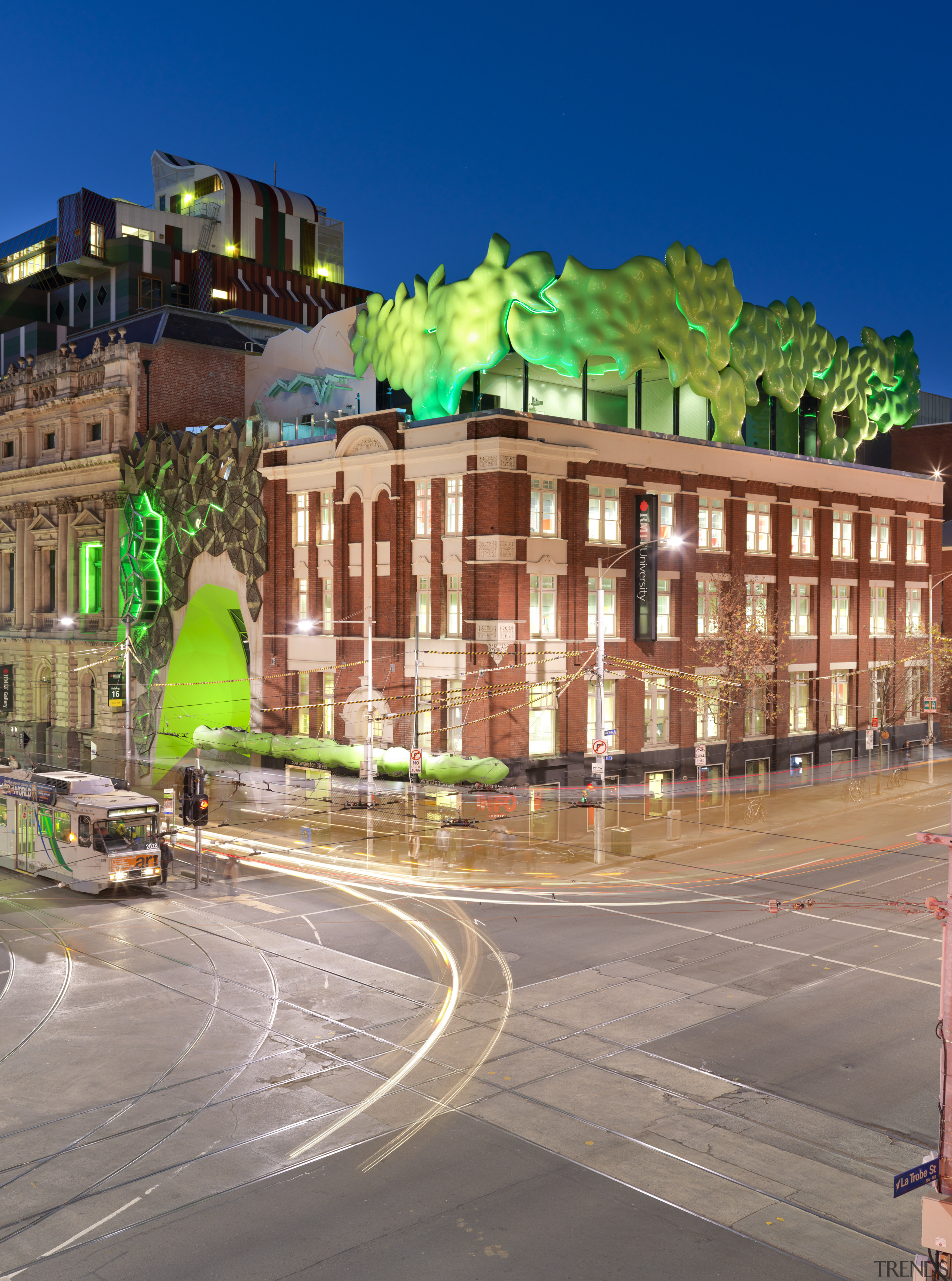 View of RMIT building in Melbourne with green architecture, building, city, downtown, evening, facade, home, house, landmark, metropolis, metropolitan area, mixed use, neighbourhood, plaza, real estate, residential area, sky, street, town, town square, urban area, gray