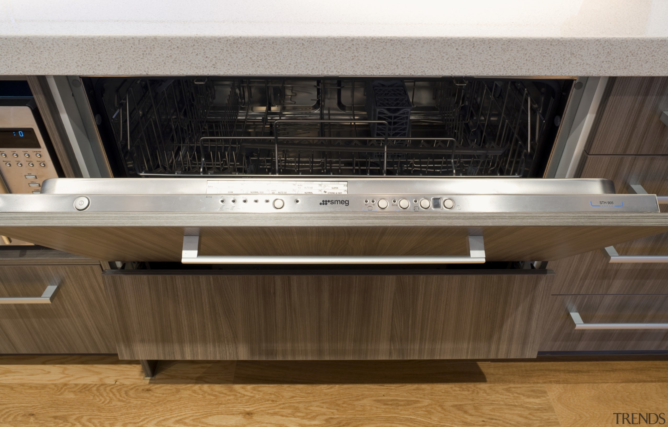 View of the Smeg STH905 horizontal dishwasher available electronics, floor, furniture, home appliance, kitchen appliance, table, brown