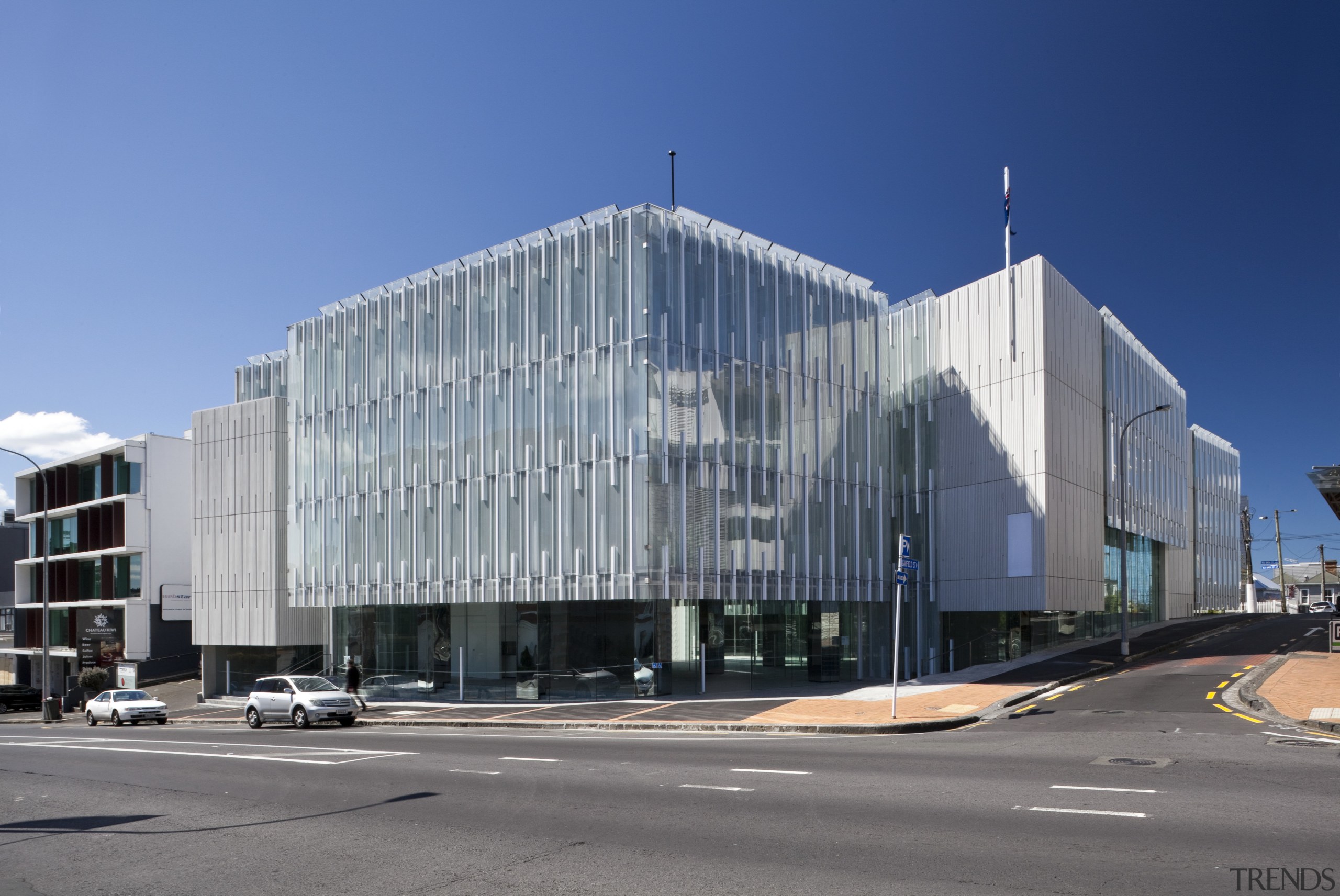 A translucent double facade on the Geyer complex architecture, building, commercial building, convention center, corporate headquarters, daytime, facade, headquarters, metropolis, metropolitan area, mixed use, real estate, sky, structure, gray