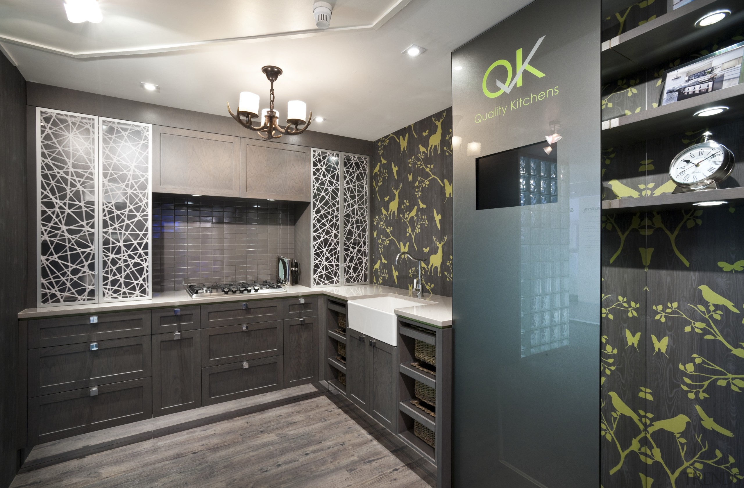 This display kitchen for Quality Kitchens showcases aluminium-framed countertop, interior design, kitchen, real estate, room, gray, black