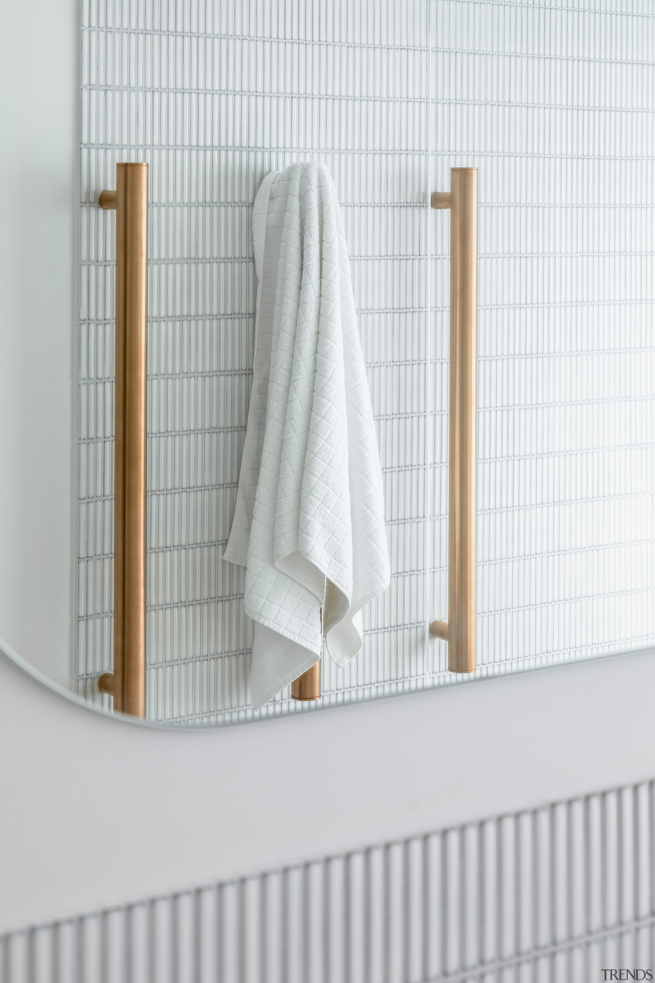 Vertical towel rails in reflection. - Light, white 