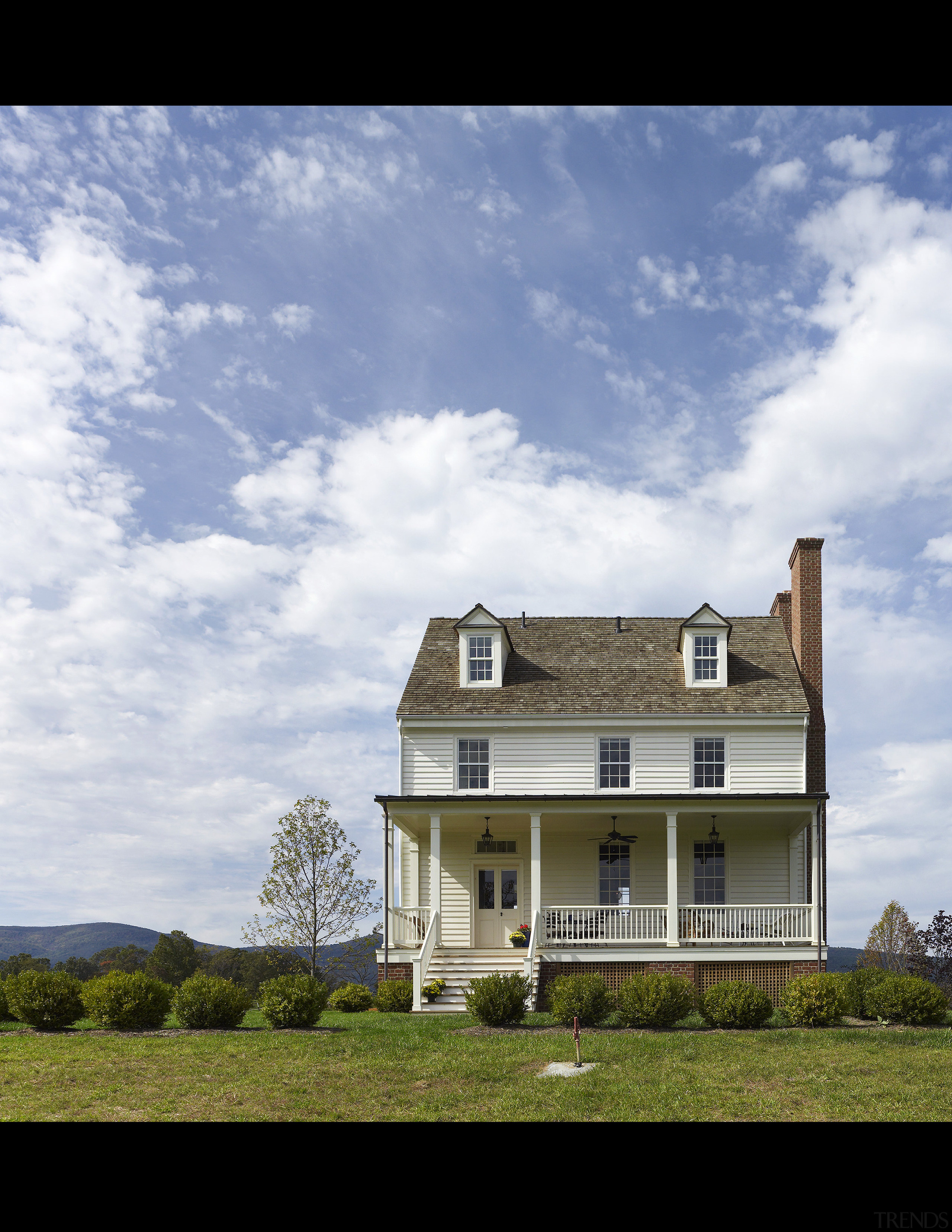 This home was built by Tom Glass of building, cloud, cottage, estate, facade, farmhouse, grass, home, house, property, real estate, residential area, rural area, sky, tree, white