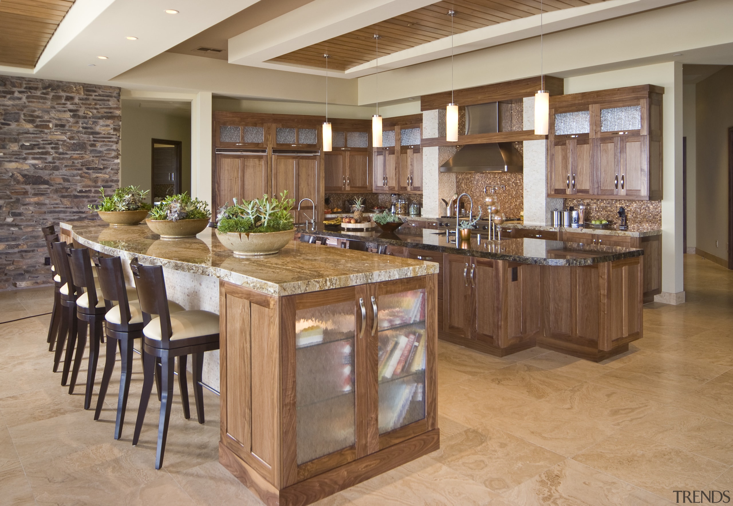 View of the kitchen area of this home cabinetry, countertop, cuisine classique, floor, flooring, hardwood, interior design, kitchen, table, wood flooring, brown, orange