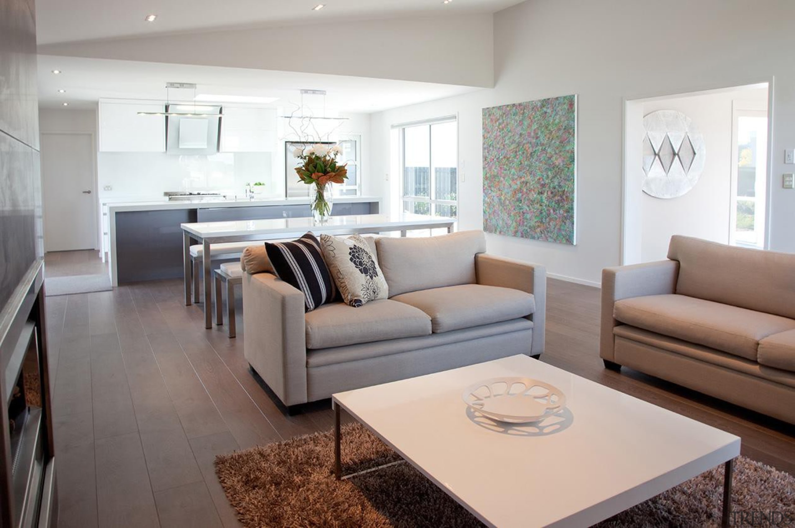 For more information, please visit www.gjgardner.co.nz coffee table, couch, floor, flooring, furniture, hardwood, home, interior design, living room, real estate, room, table, wood flooring, gray