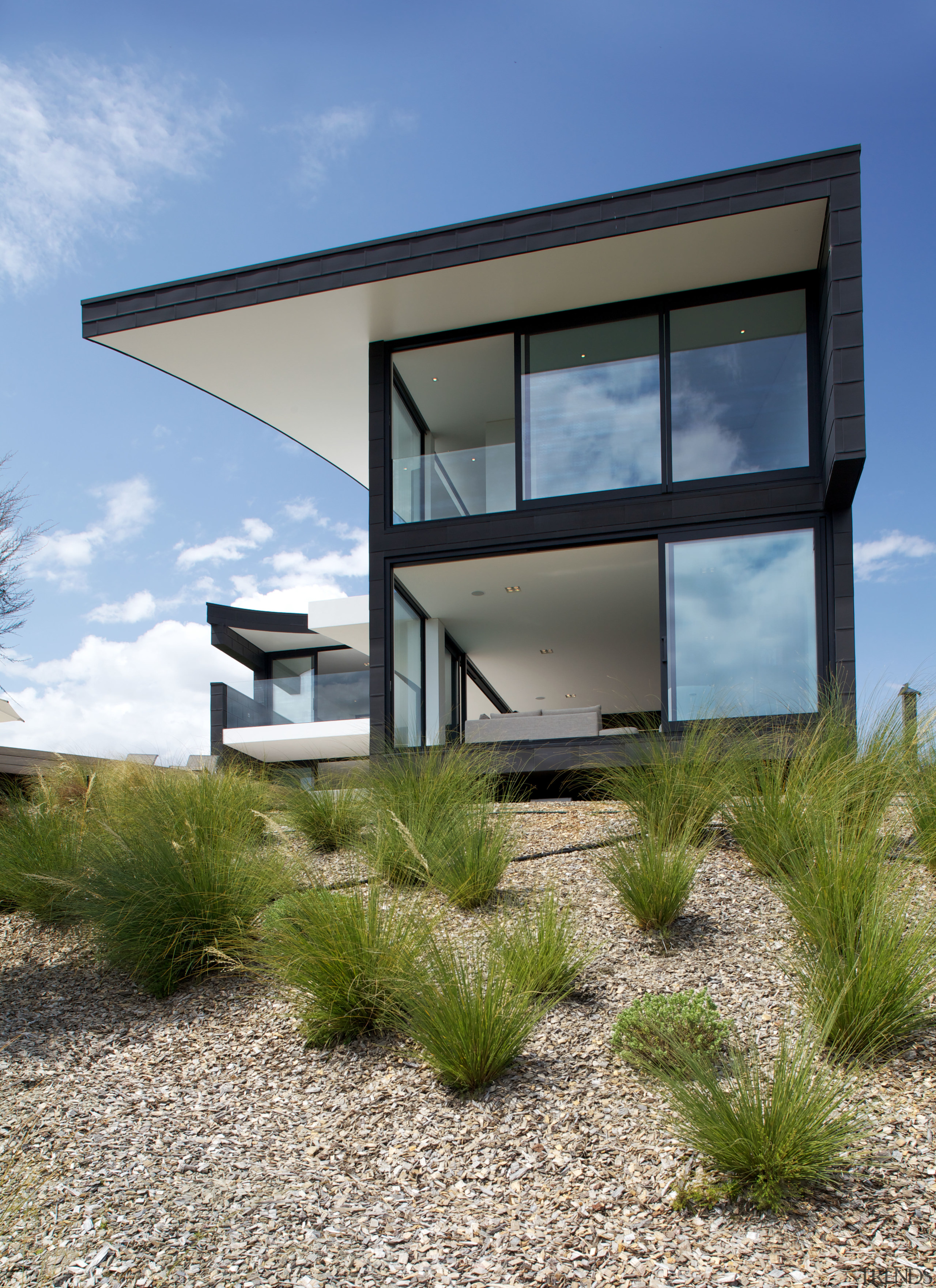 This spacious holiday home by architect Thom Craig architecture, building, facade, home, house, property, real estate, window, gray, teal