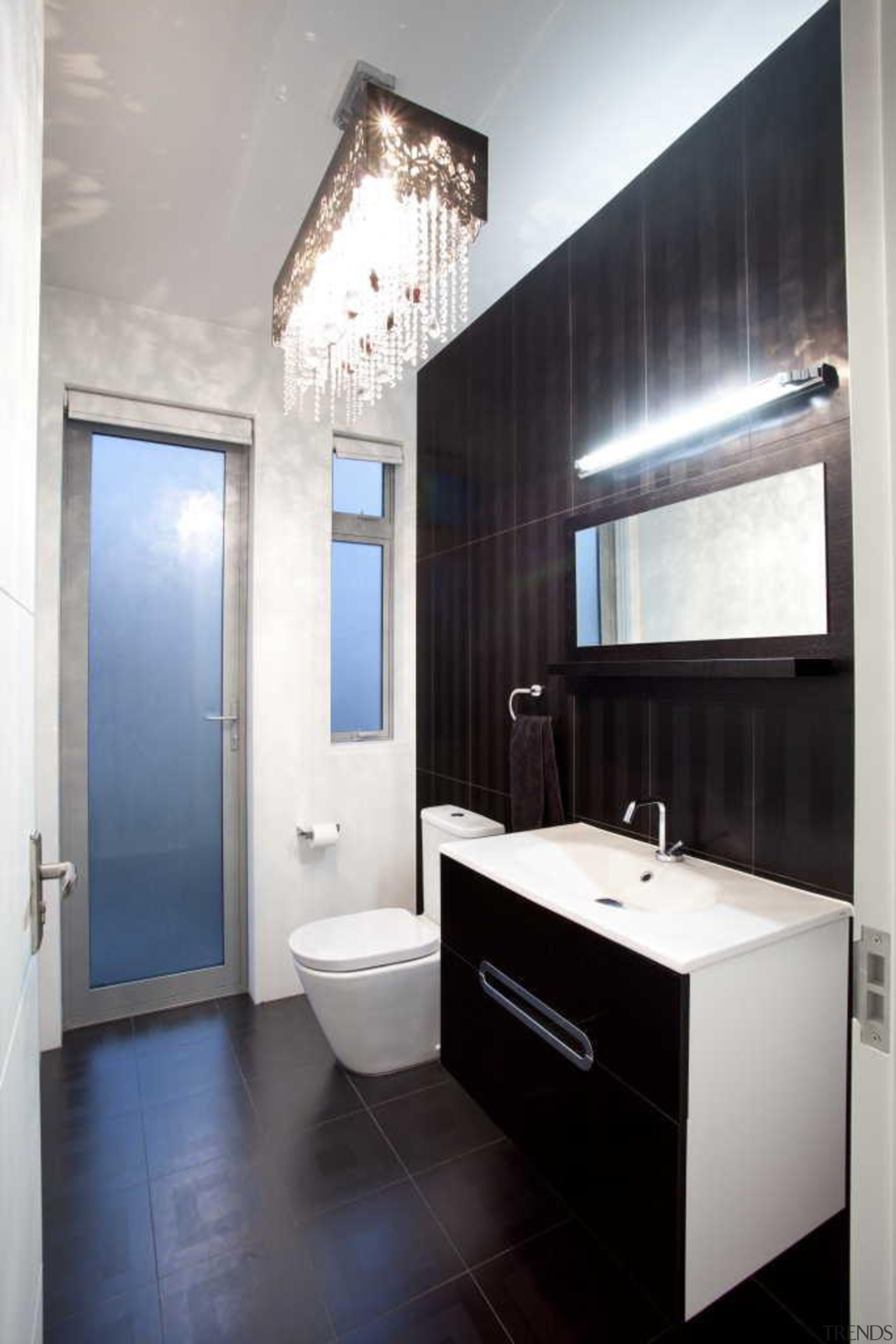 Elegant bathroom with beautiful ceiling light - Bathroom bathroom, bathroom accessory, bathroom cabinet, ceiling, floor, interior design, room, sink, white, black