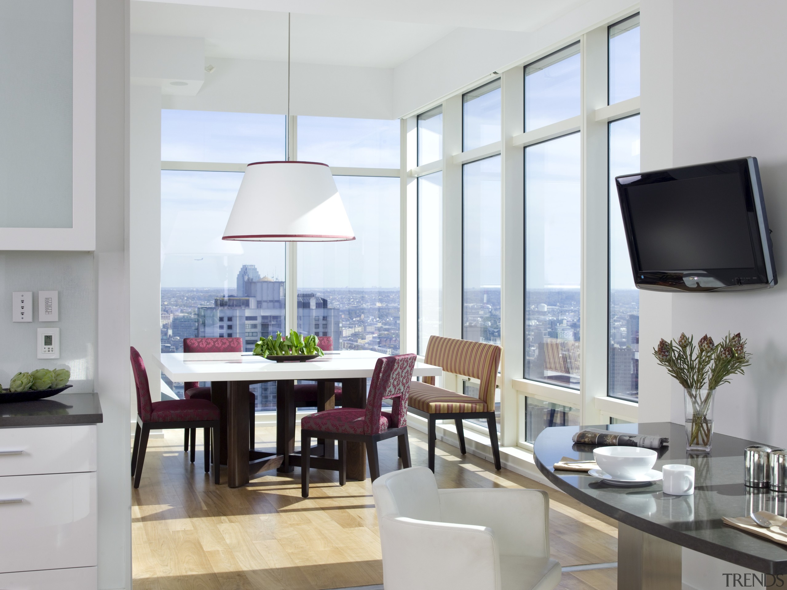 View of contemporary apartment kitchen which features timber apartment, interior design, living room, real estate, room, table, window, gray, white