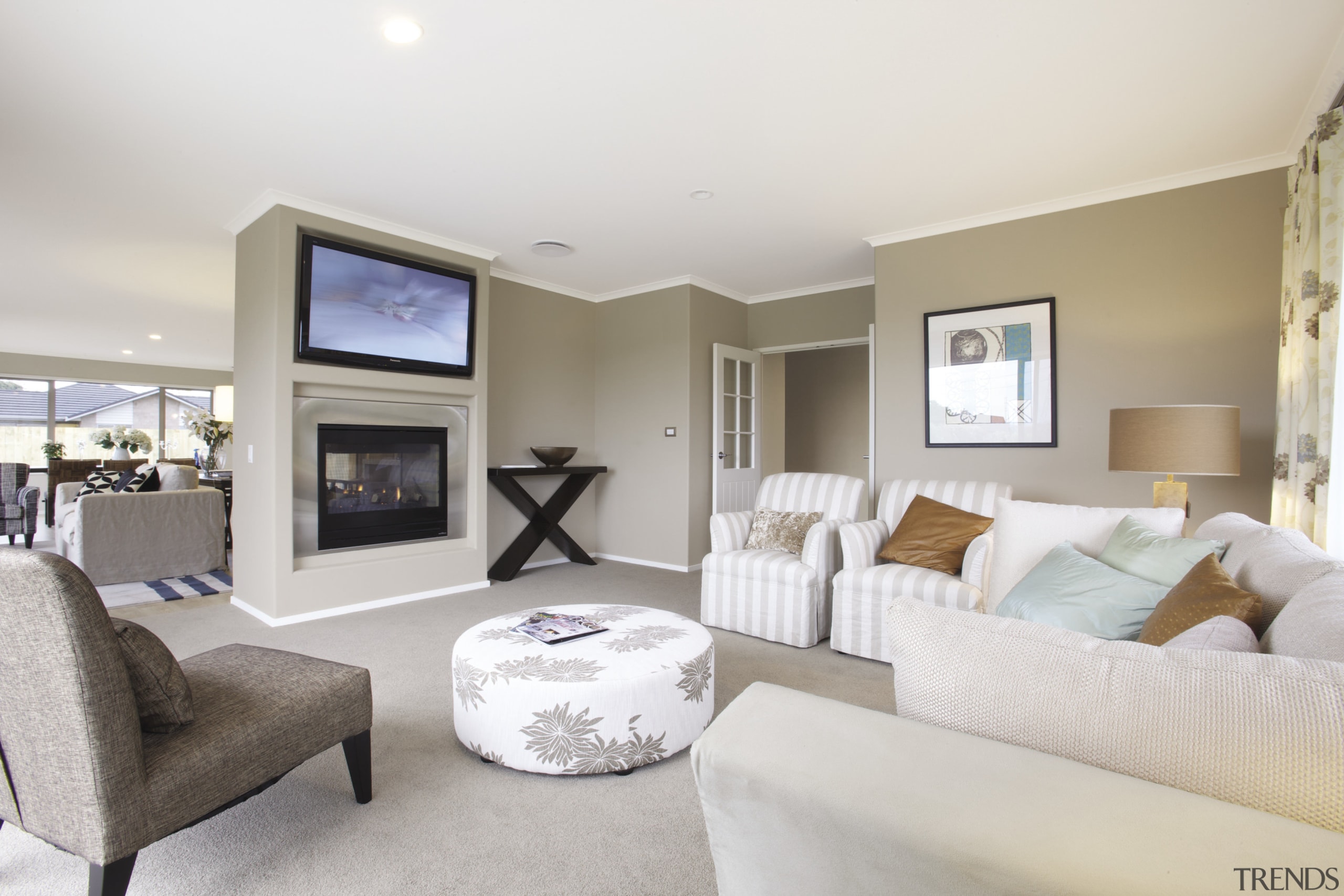 View of living area at Platinum Homes show ceiling, estate, home, interior design, living room, property, real estate, room, white