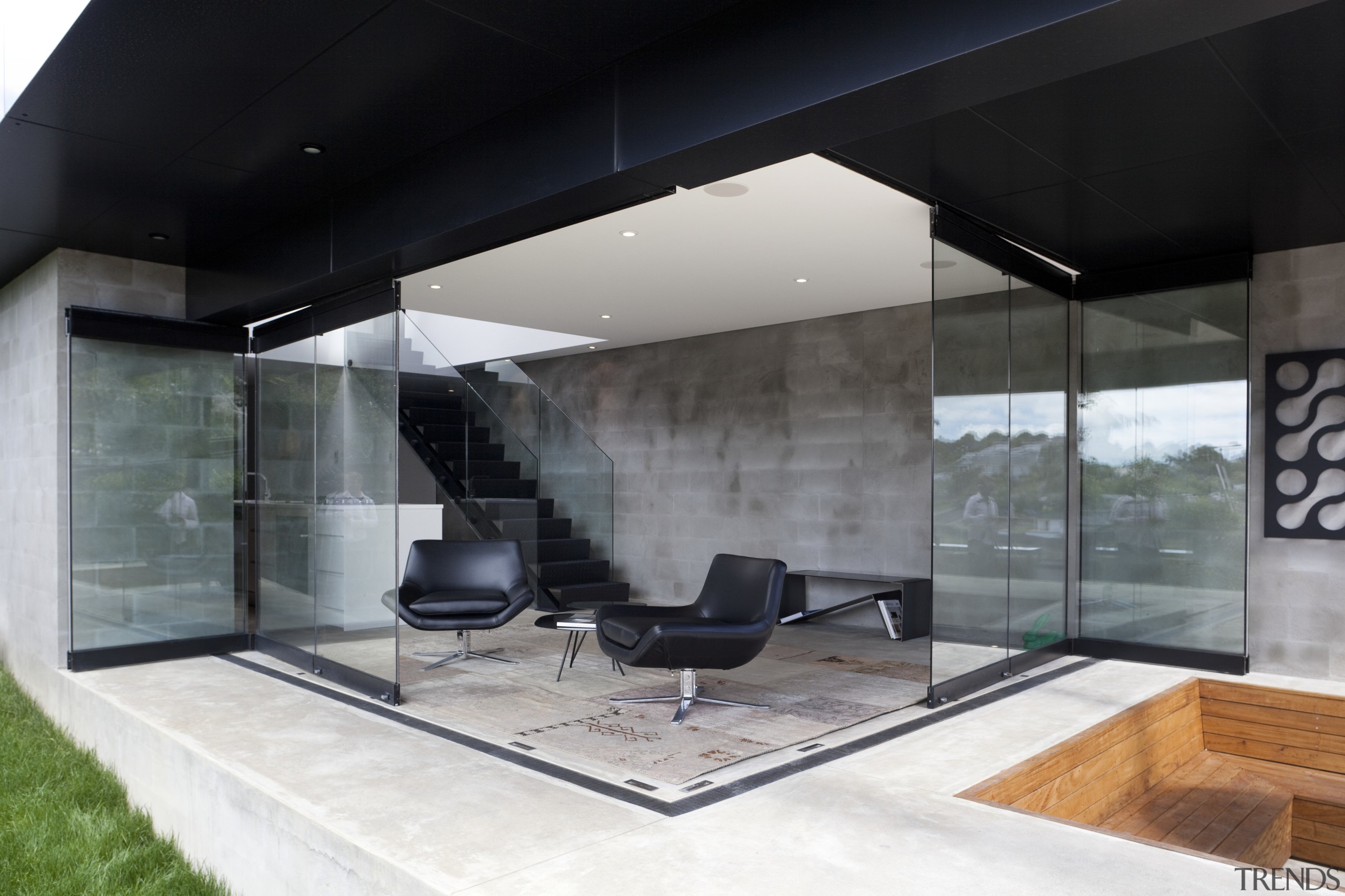 Black exterior,concrete, outside house looking at patio area architecture, house, interior design, black, white