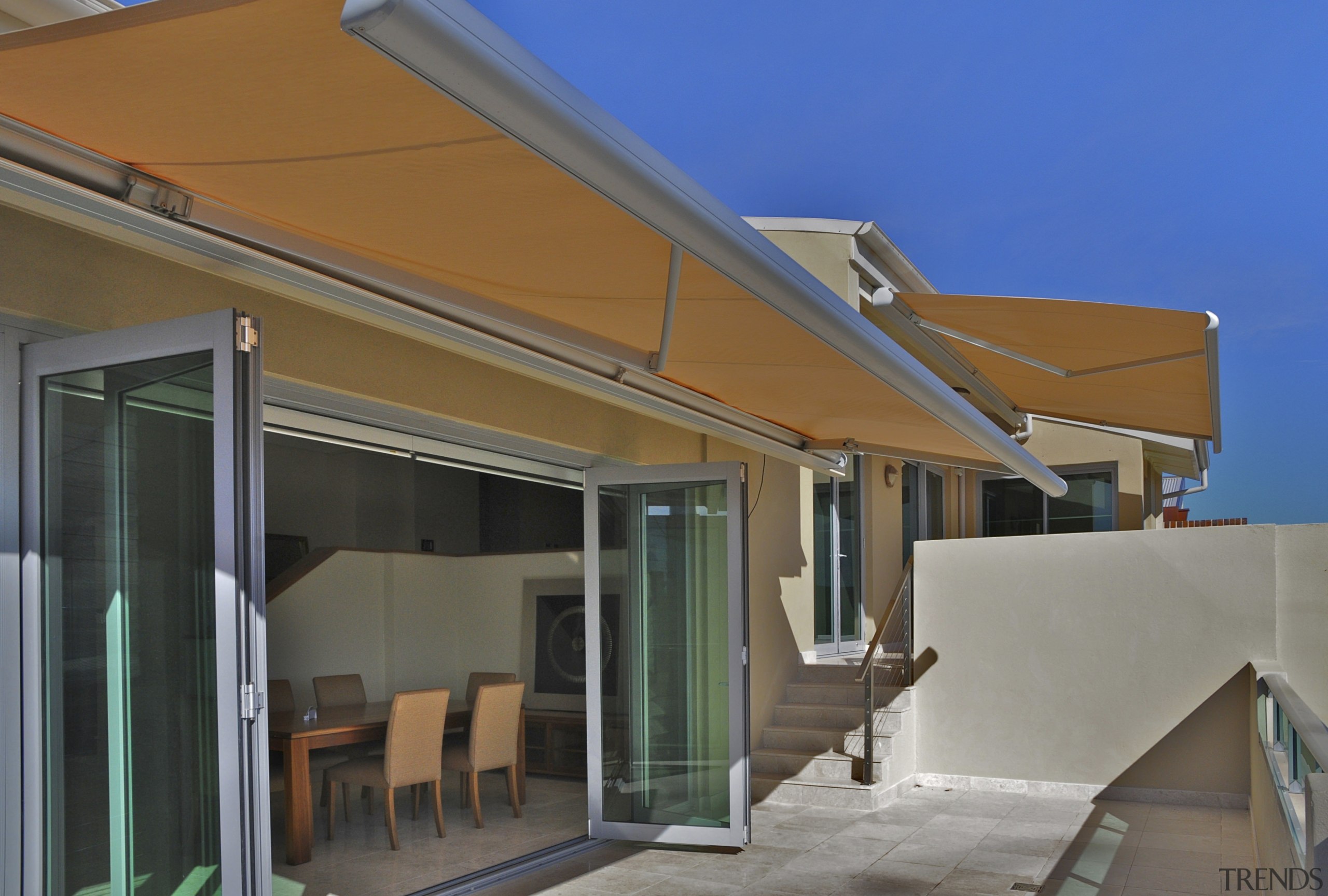 View of the new Linfield Apartments- a modern architecture, awning, daylighting, facade, home, house, property, real estate, residential area, roof, shade, window, gray, brown