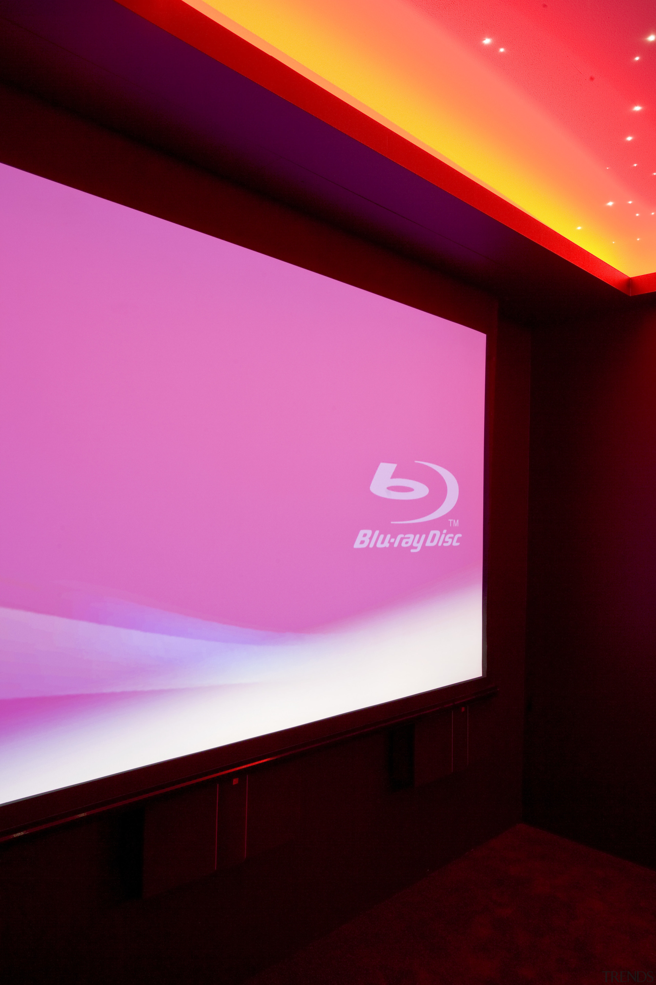 View of projector screen in home theatre. - display device, light, magenta, pink, projection screen, projector accessory, sky, red, pink