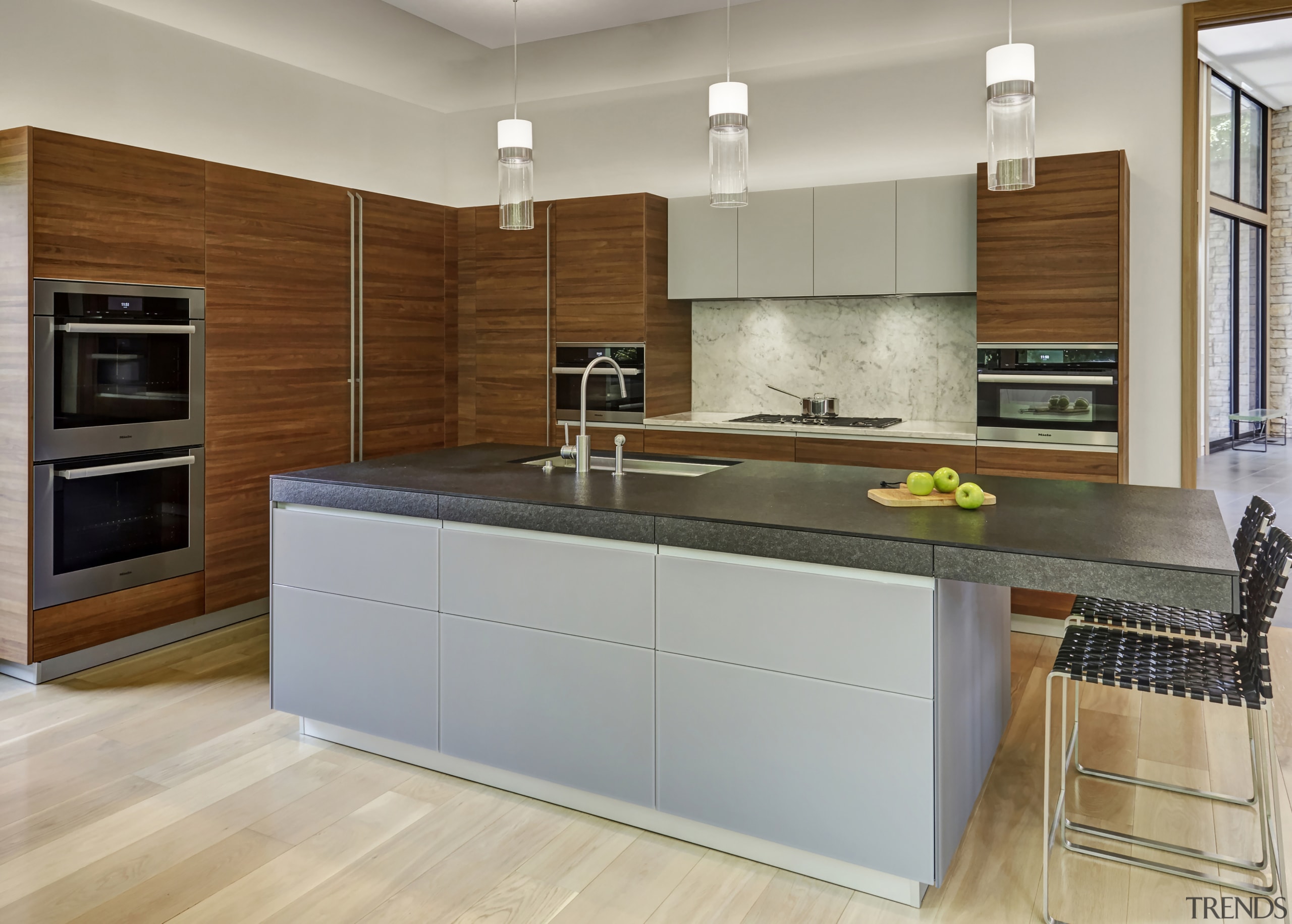 ​​​​​​​Soft, natural materials were selected for this kitchen building, cabinetry, ceiling, countertop, cuisine classique, cupboard, floor, flooring, furniture, home, home appliance, house, interior design, kitchen, kitchen appliance, kitchen stove, major appliance, material property, property, real estate, room, tile, gray, brown