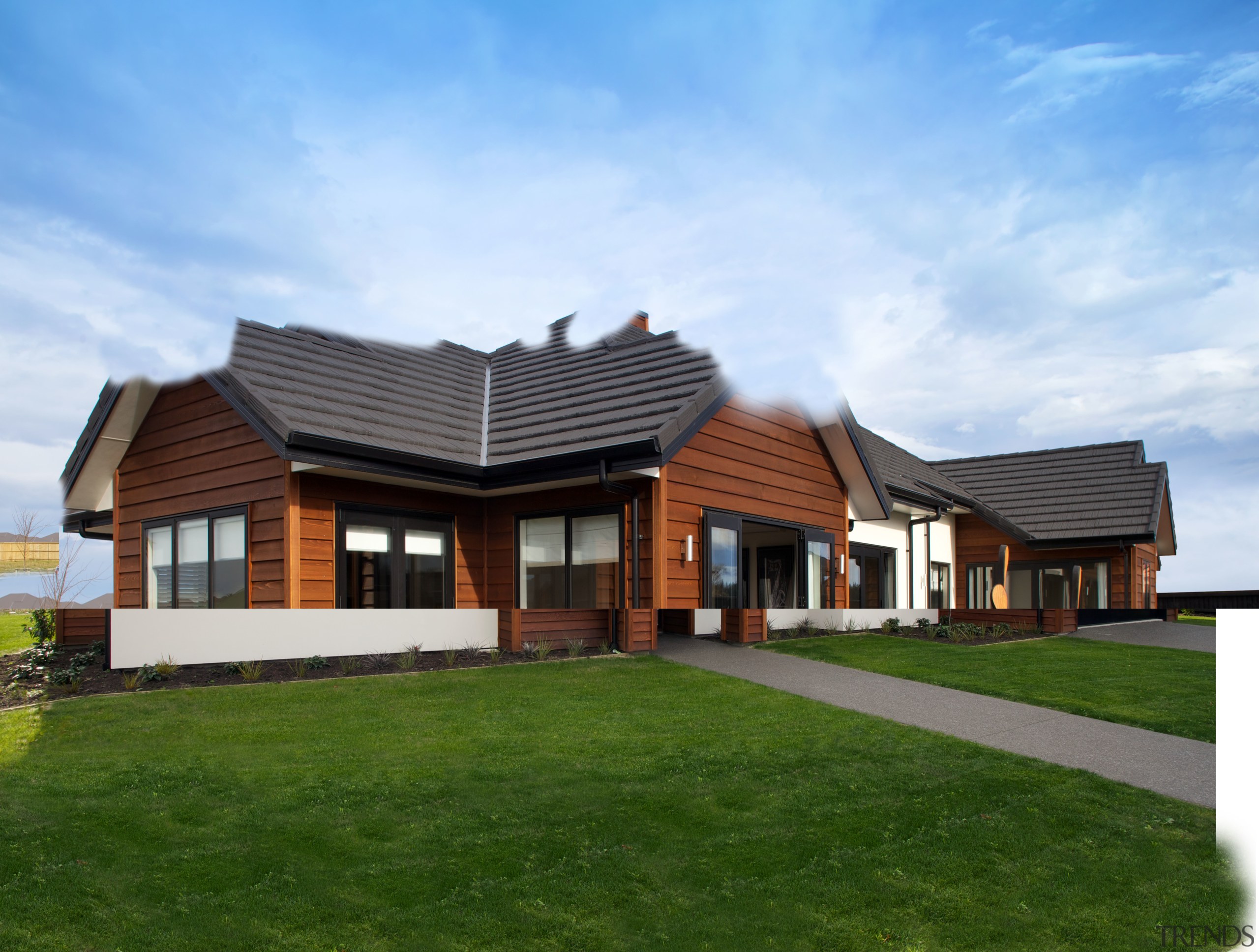 With plaster and cedar cladding, textured roof tiles cottage, elevation, estate, facade, farmhouse, home, house, land lot, property, real estate, residential area, roof, siding, sky, teal, brown