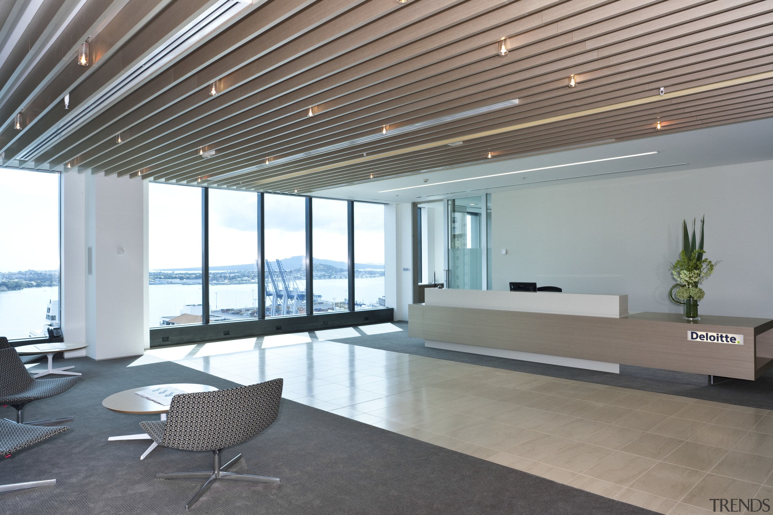 View of the new Deloitte premises which reflect architecture, ceiling, daylighting, floor, flooring, house, interior design, lobby, real estate, window, gray