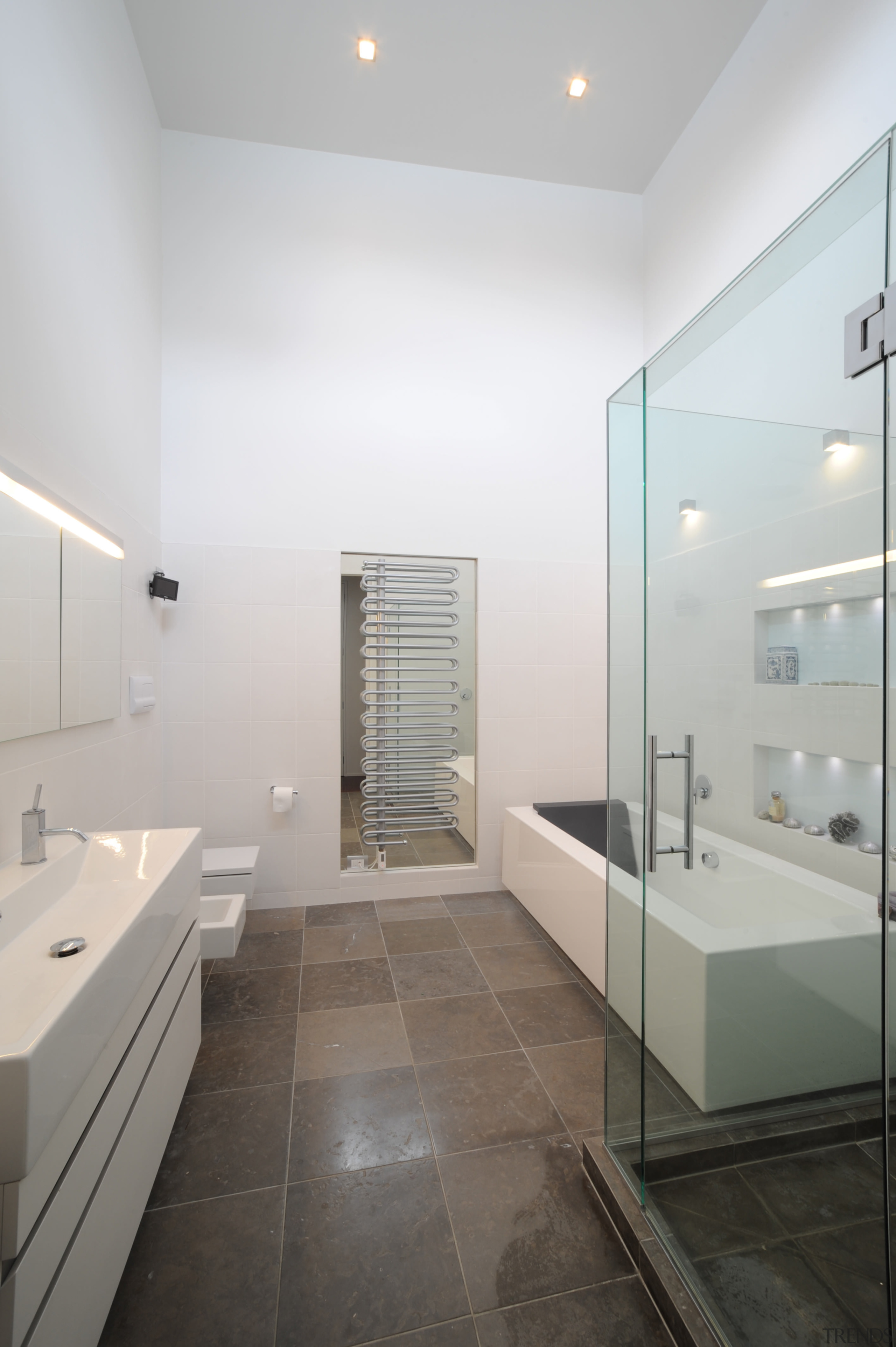 Image of a contempory bathroom designed by Elegant architecture, bathroom, daylighting, floor, flooring, home, interior design, product design, real estate, room, sink, tile, gray, white