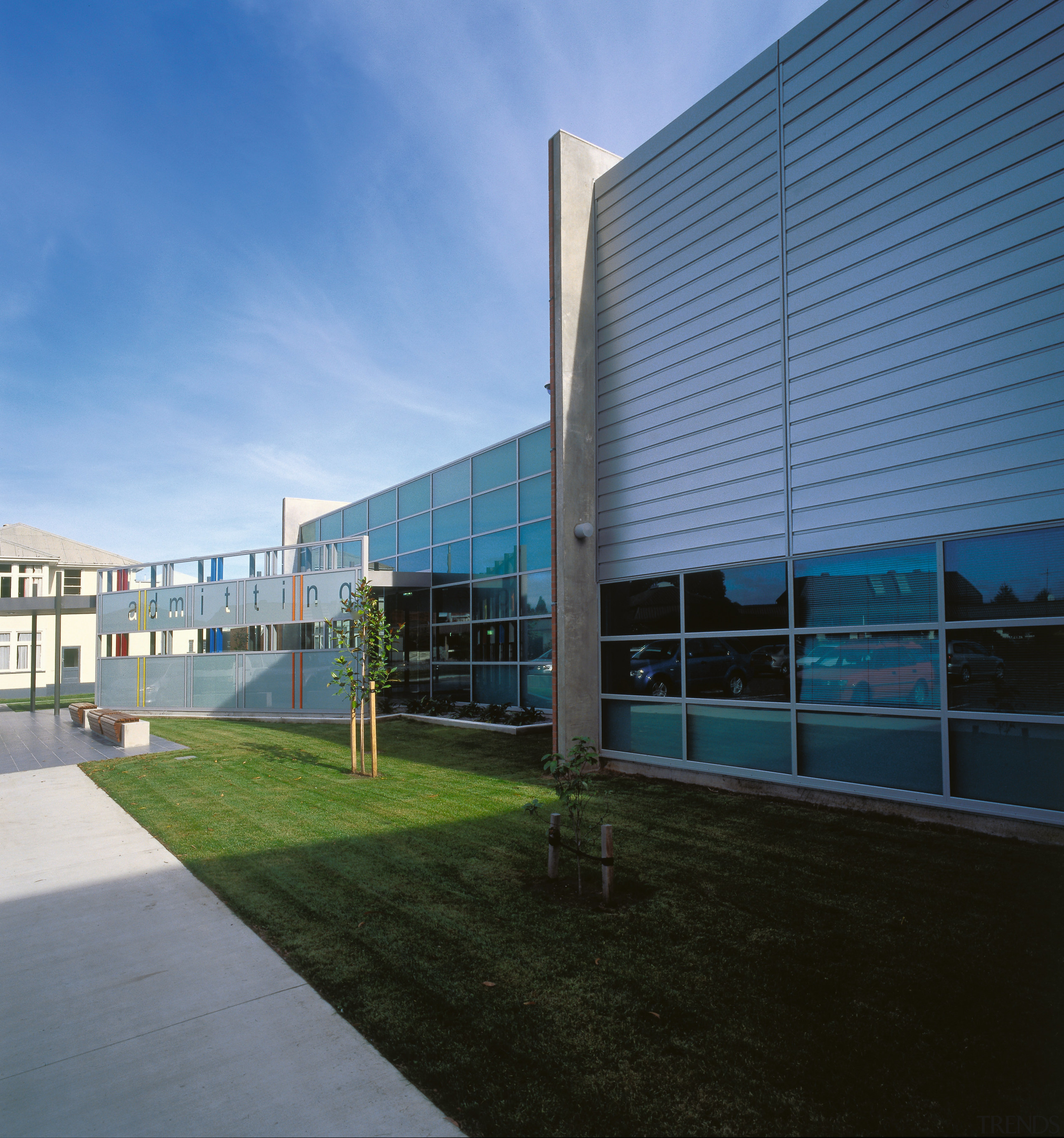 A view of Burwood Hospital's new surgical unit architecture, building, commercial building, corporate headquarters, facade, headquarters, house, leisure centre, real estate, sky, teal, black
