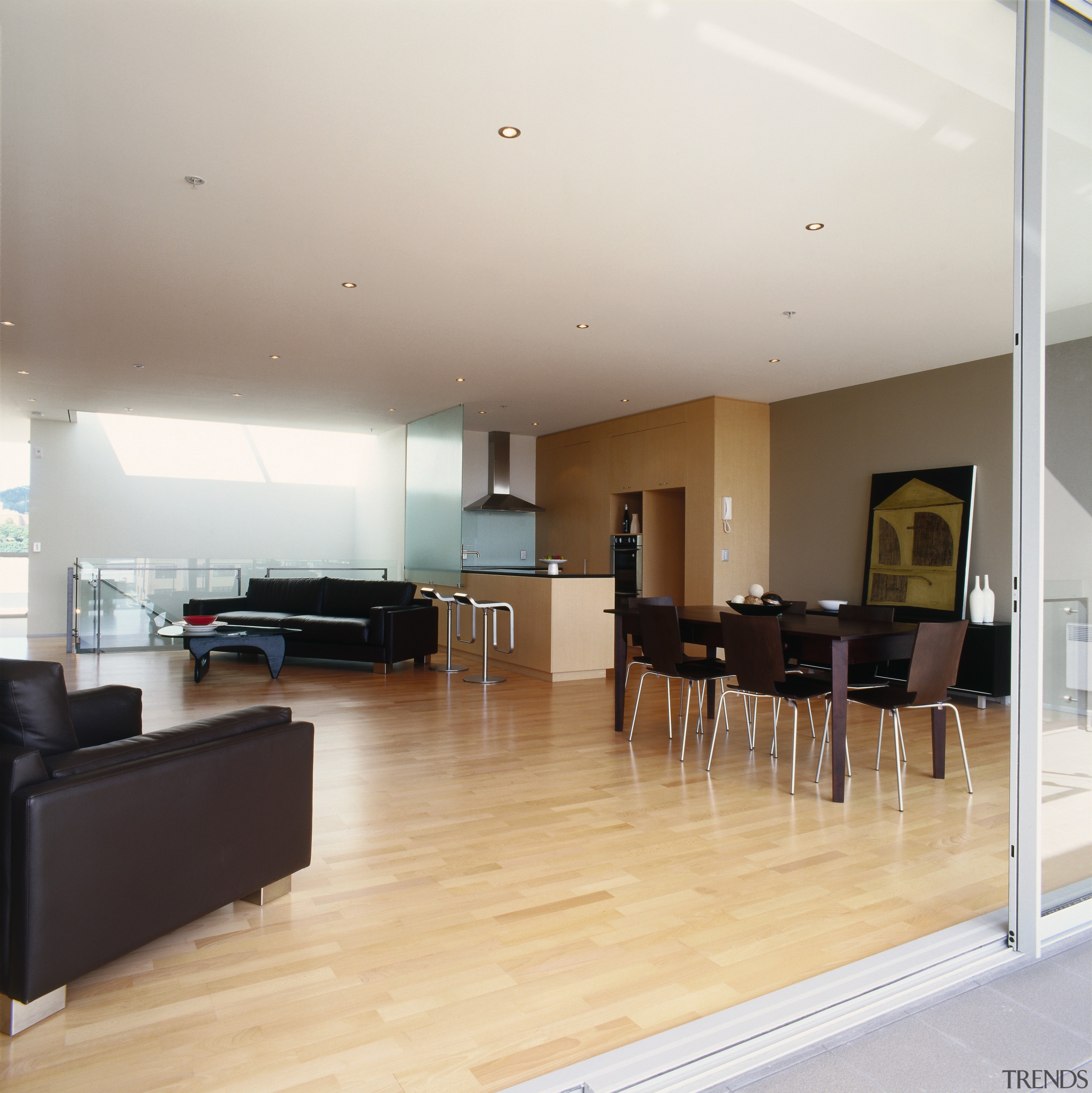 Open plan apartment living area with maple timber apartment, ceiling, floor, flooring, hardwood, house, interior design, laminate flooring, living room, property, real estate, room, wood flooring, white