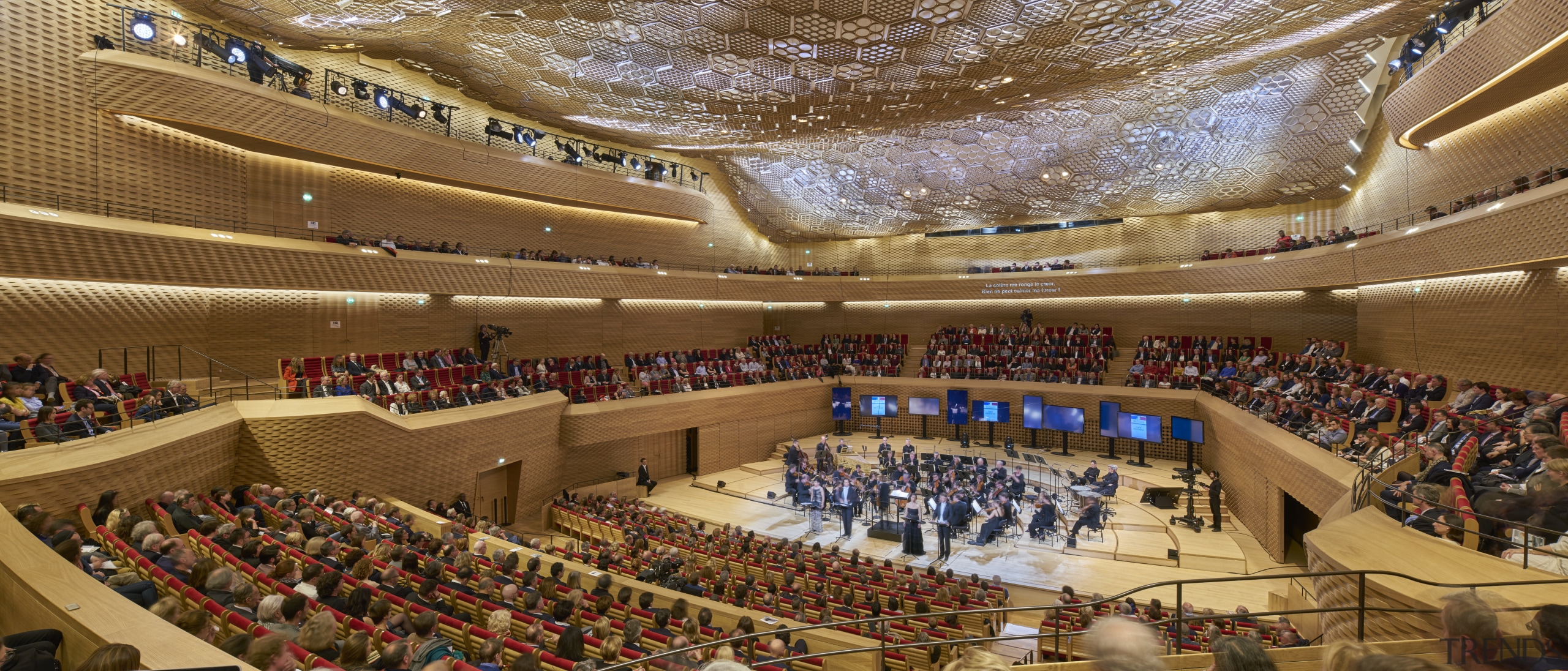 One of the theatres in La Seine Musicale, arena, audience, auditorium, concert hall, performing arts center, sport venue, structure, theatre, brown