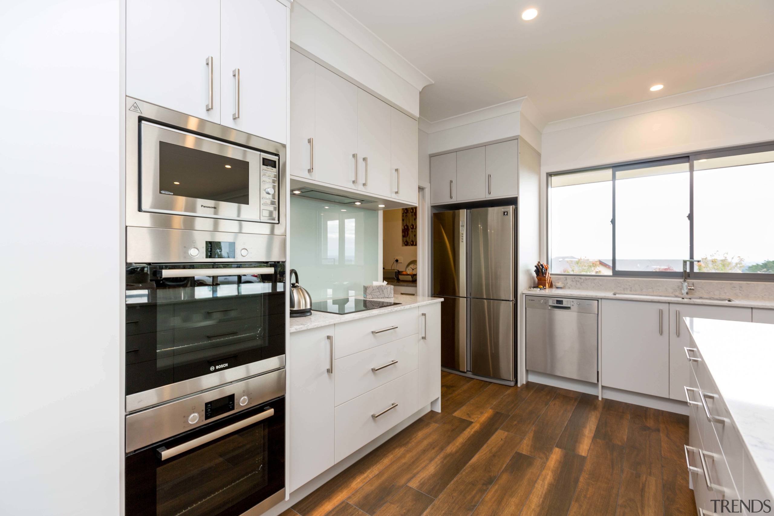 In the kitchen of this new house designed countertop, cuisine classique, home appliance, interior design, kitchen, property, real estate, room, white