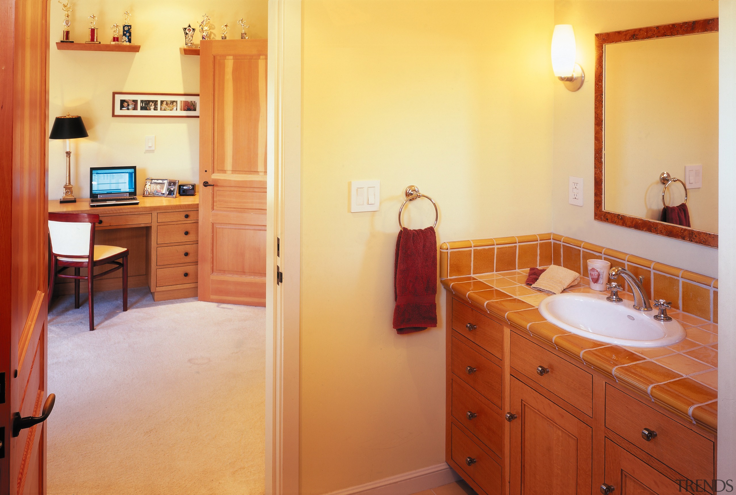 A view of a home by Hedgpeth Architects. bathroom, cabinetry, countertop, floor, flooring, home, interior design, kitchen, property, real estate, room, wood, orange