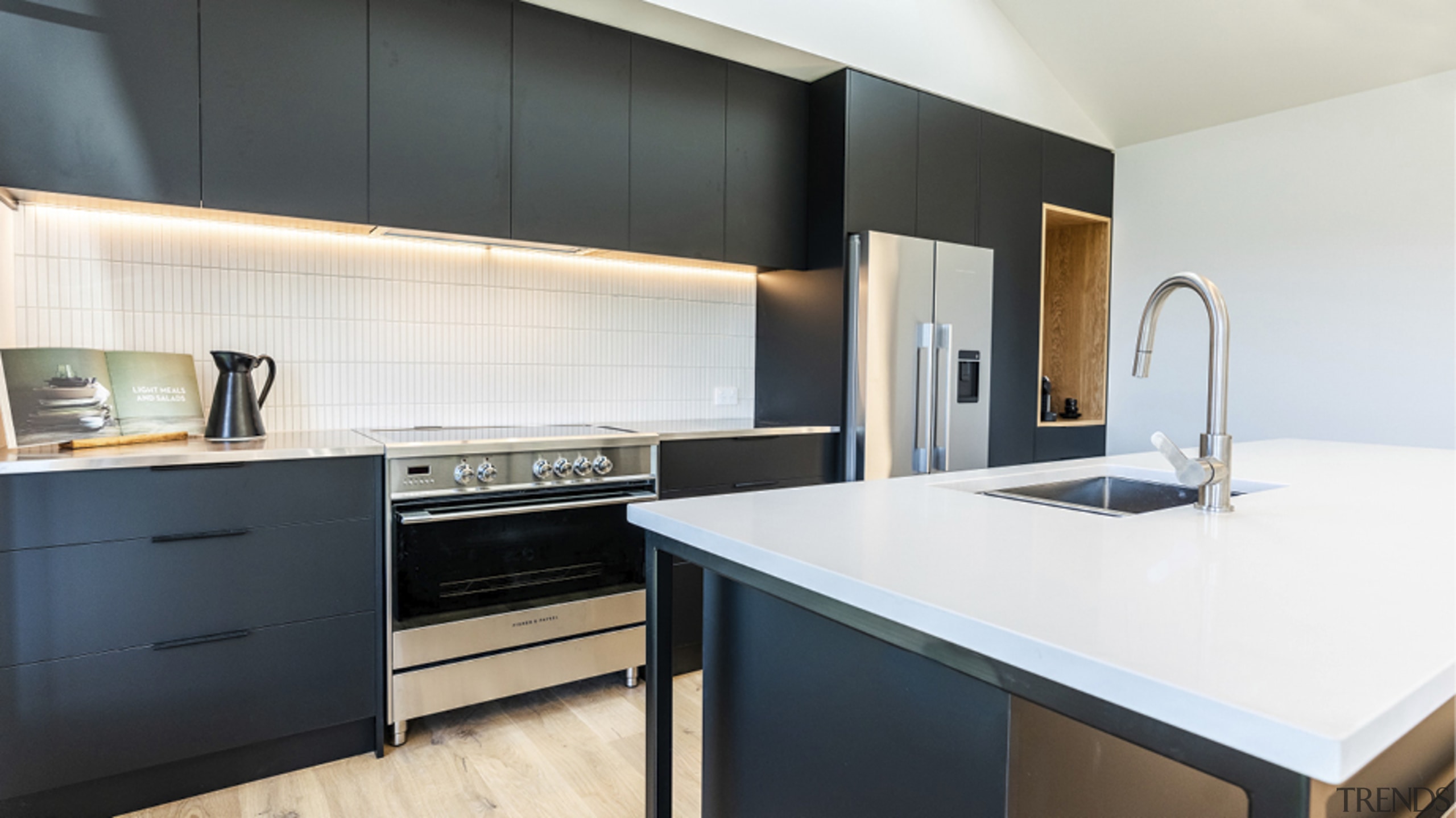 Vertical subway tiles provide a classic splashback with 