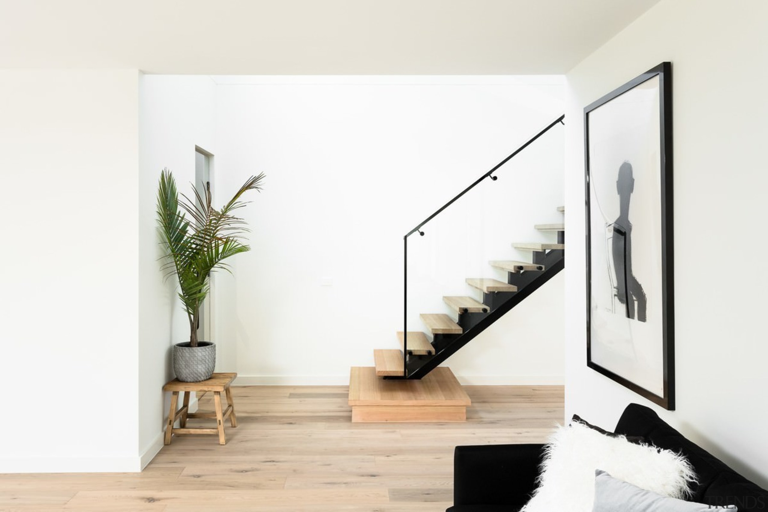 A raised pedestal provides a launching point for furniture, home, interior design, product design, stairs, white