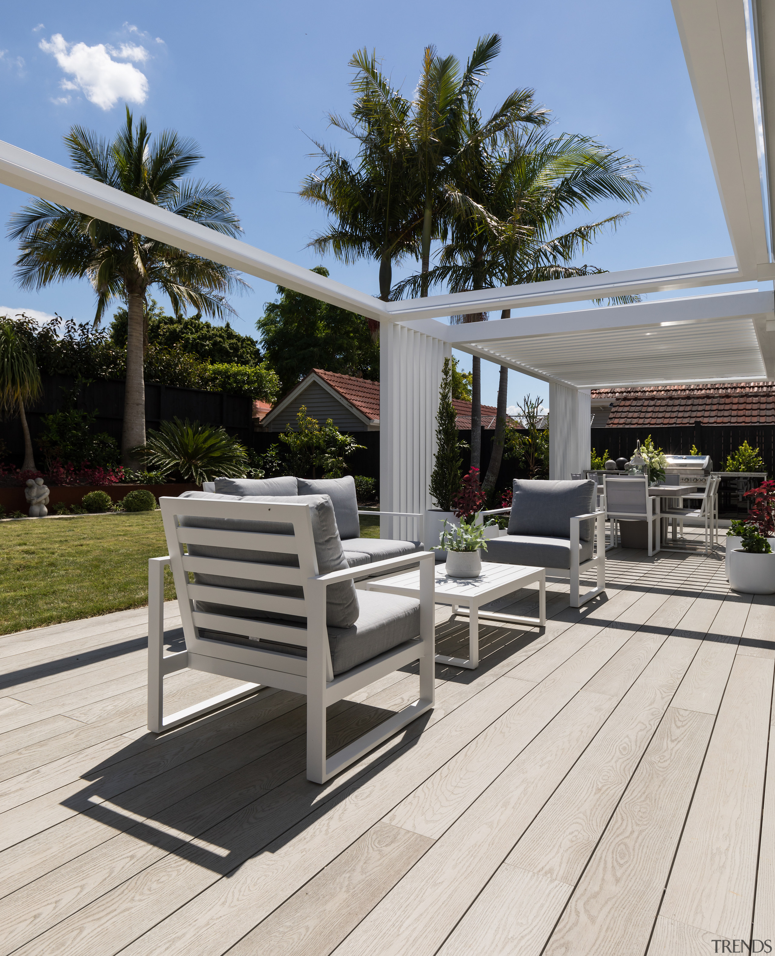 The central outdoor lounging space. - Sunshine, shade 