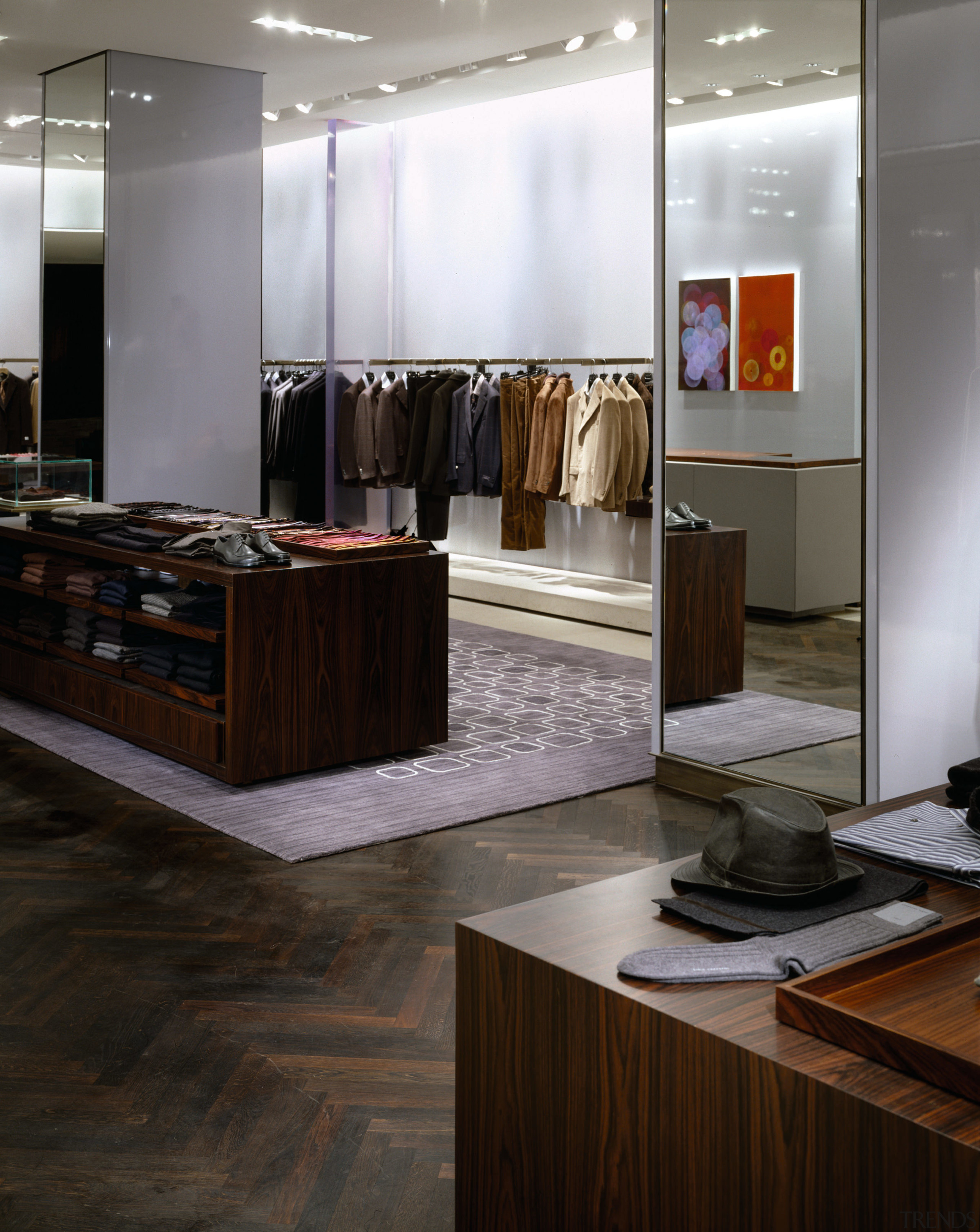 view of the menswear area showing oakwood fumed boutique, floor, flooring, furniture, hardwood, interior design, wood, wood flooring, black, gray