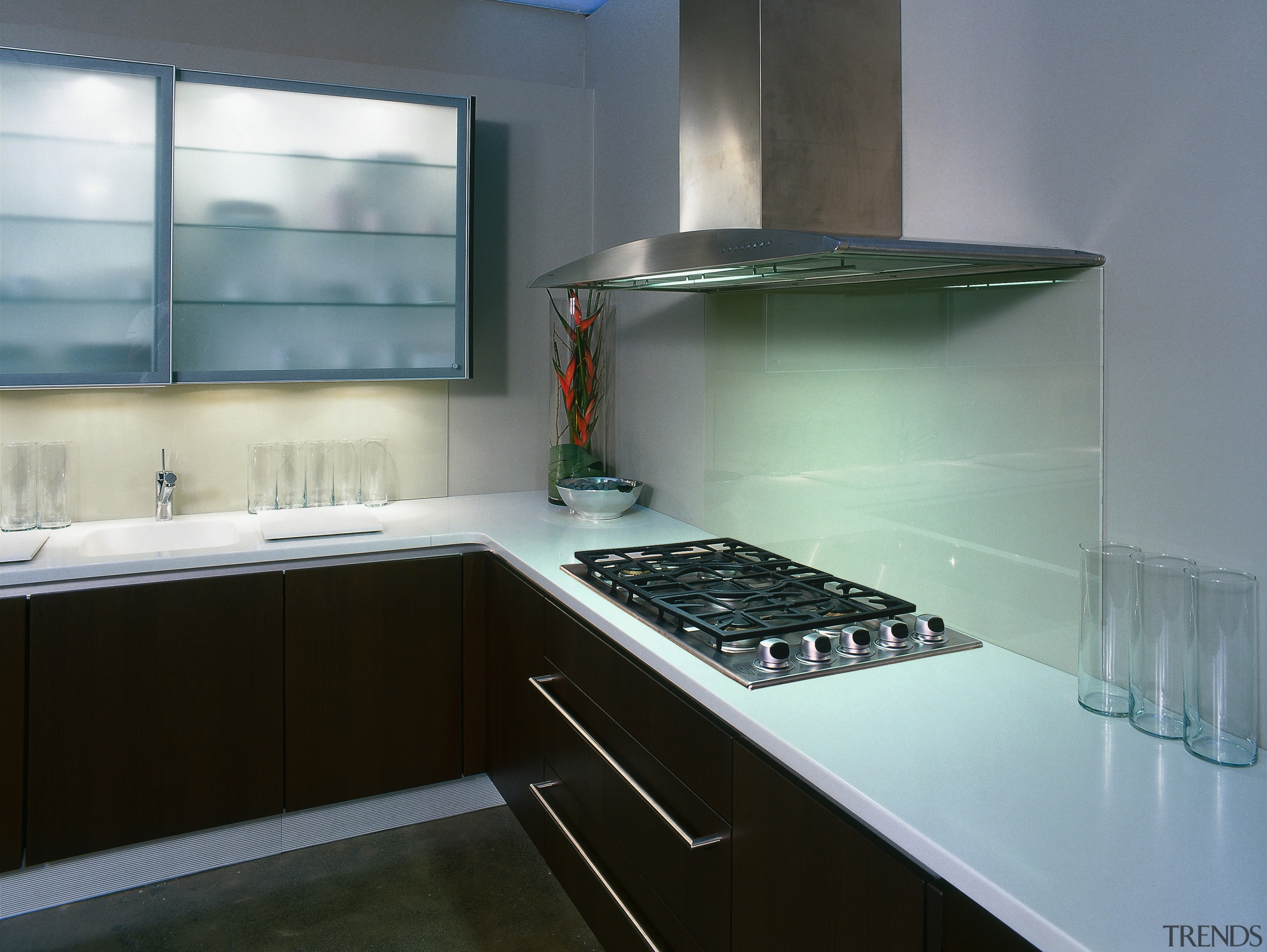 Kitchen with dark cabinetry, white benchtops, stainless steel countertop, glass, interior design, kitchen, gray, black