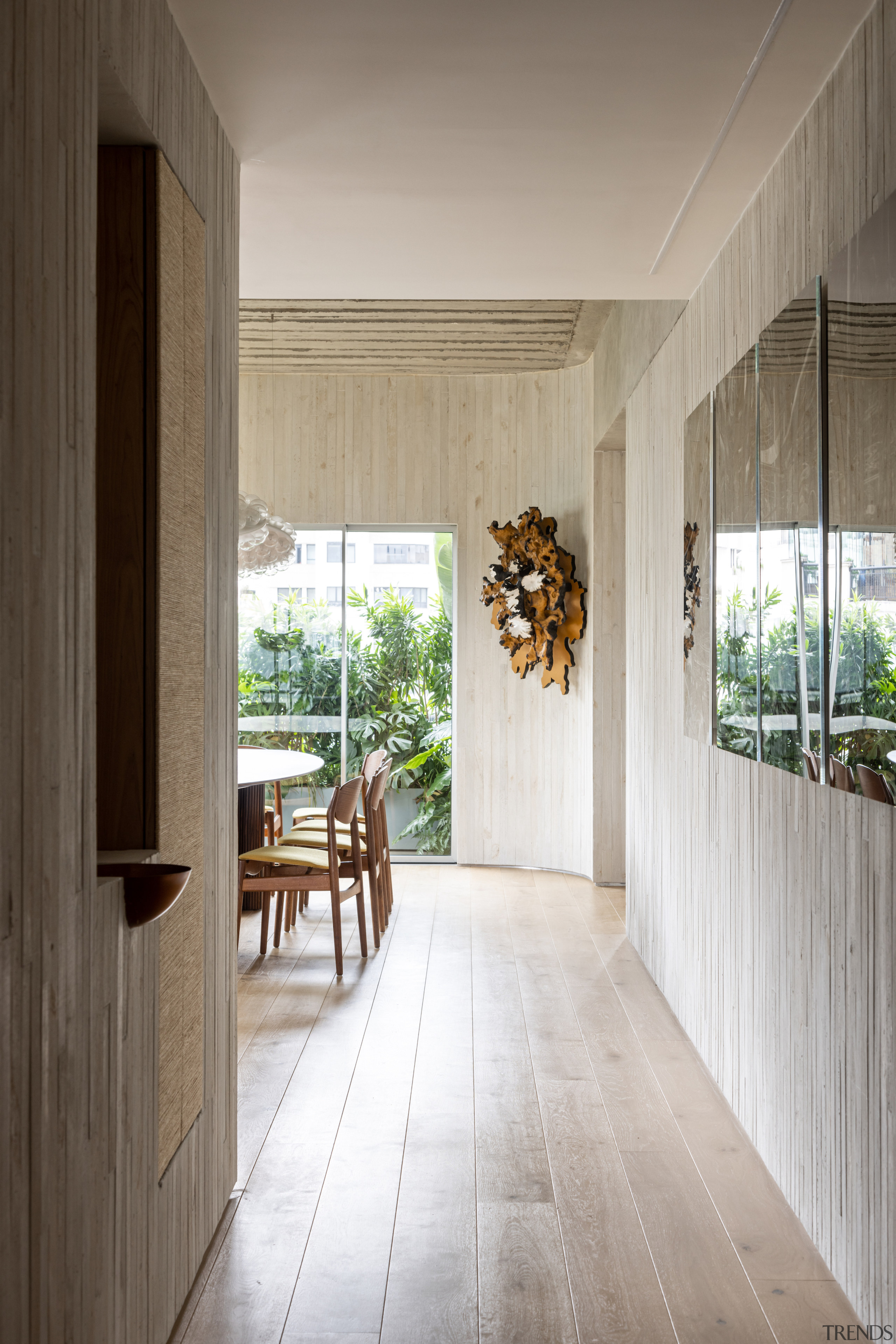 Looking from the entry hall to the dining 