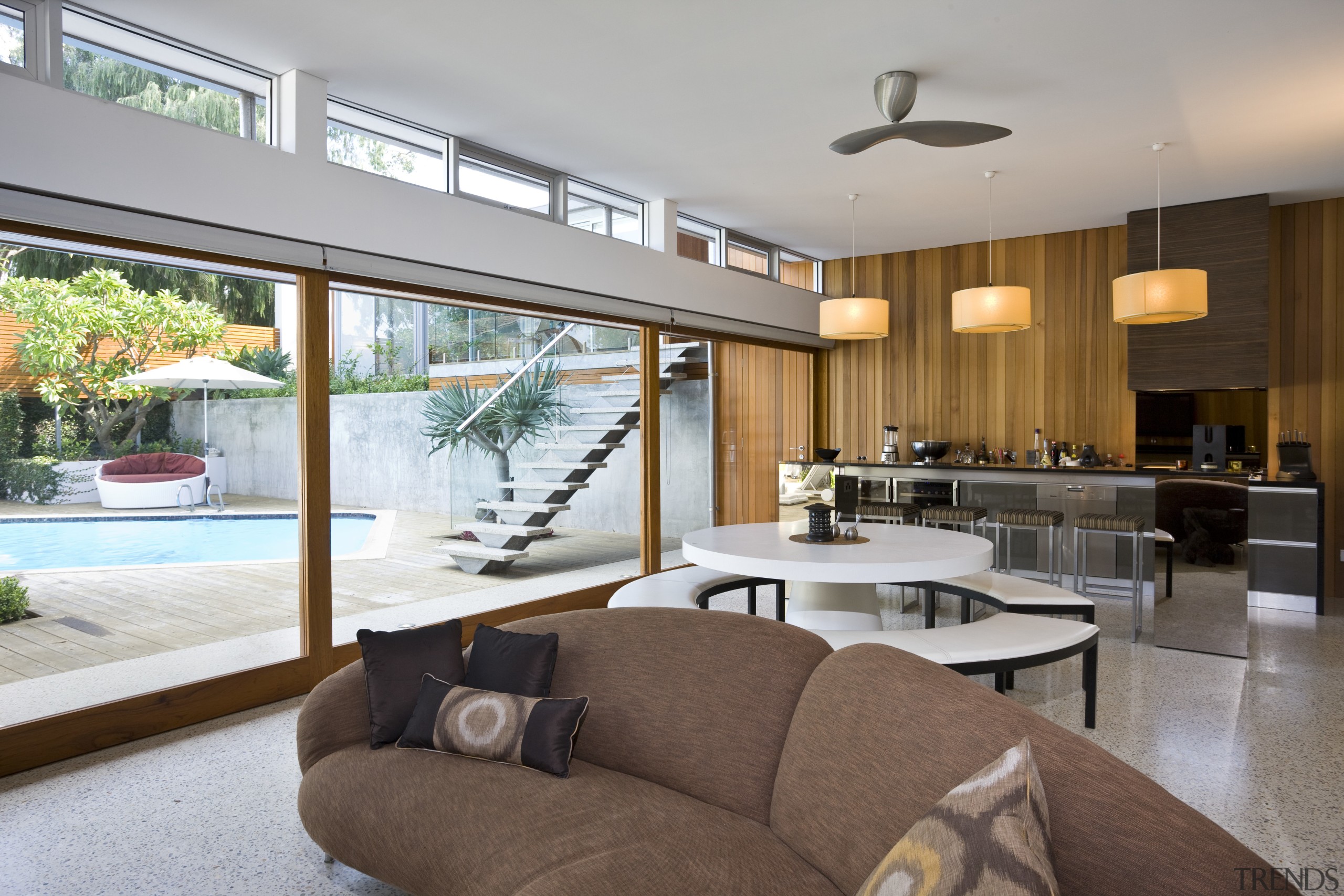 View of the poolside living area - View architecture, ceiling, house, interior design, living room, real estate, window, gray, brown