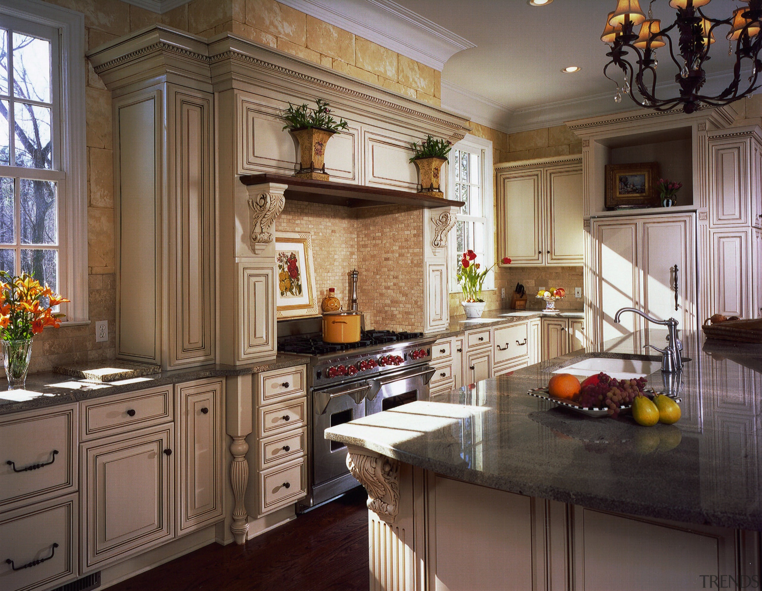 A view of a kitchen designed by Cornerstone cabinetry, countertop, cuisine classique, home, interior design, kitchen, room, window, brown