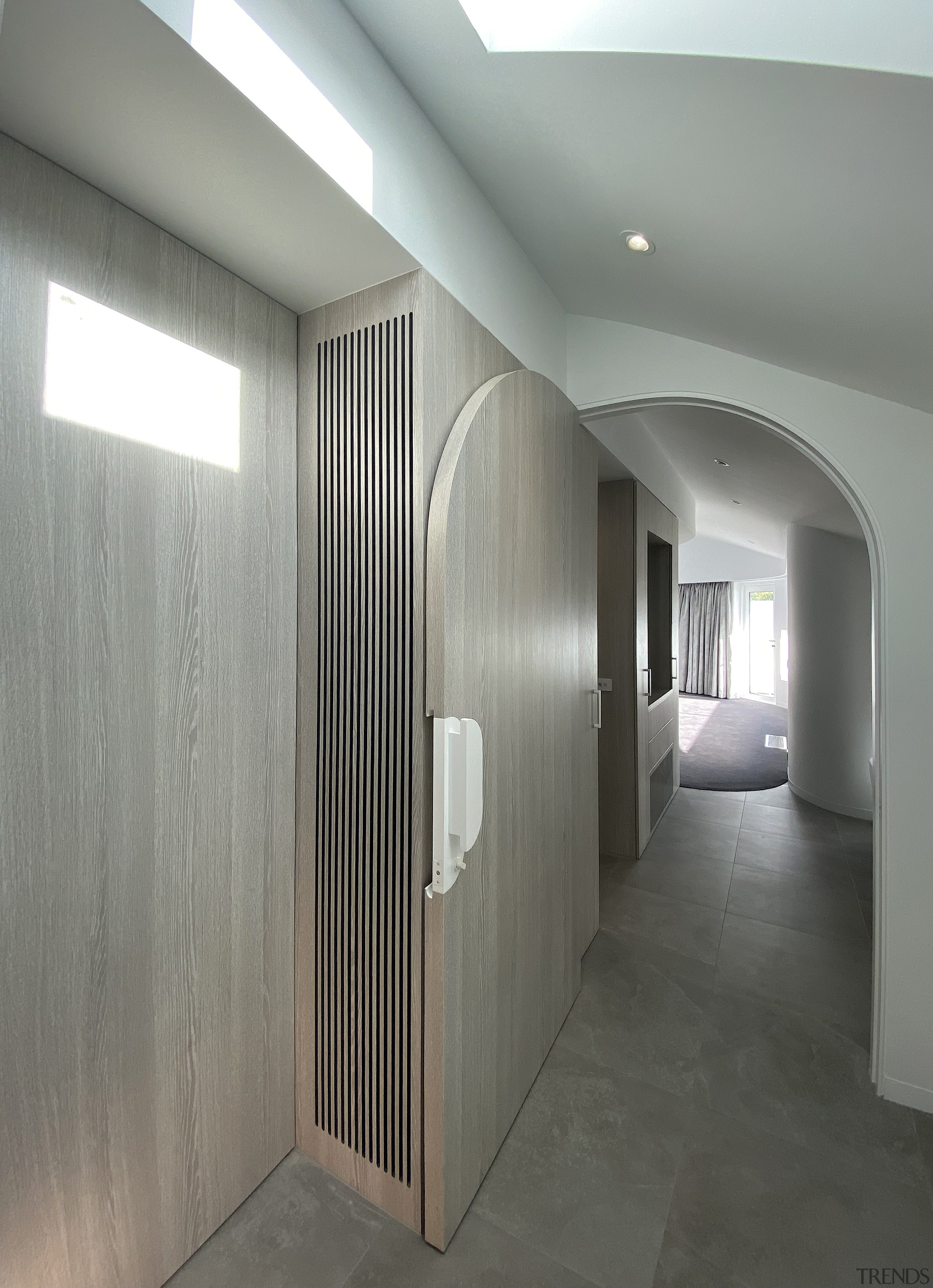 A hallway skylight adds to the suite's sunny 