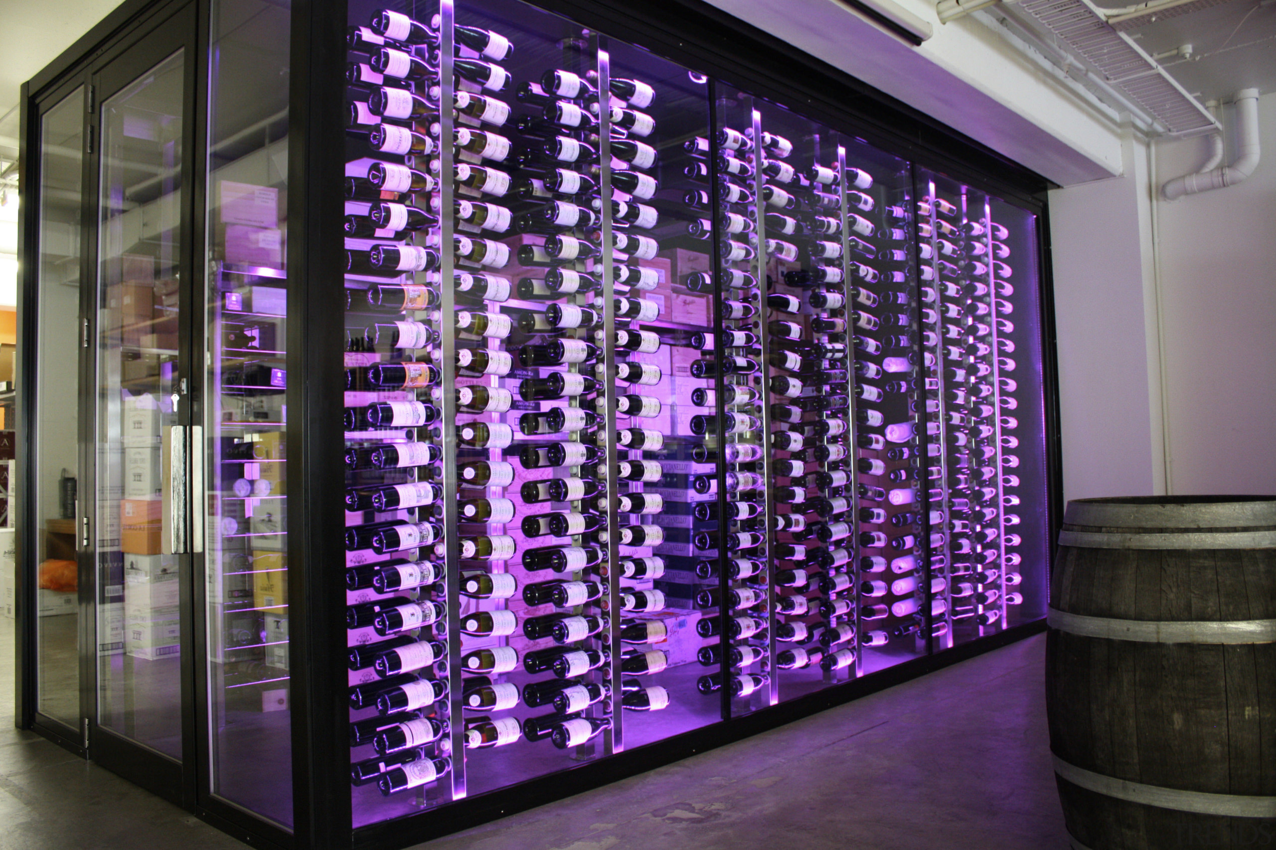 View of refrigeration solution at wine retailer. - display case, display window, glass, interior design, lobby, purple, window, purple