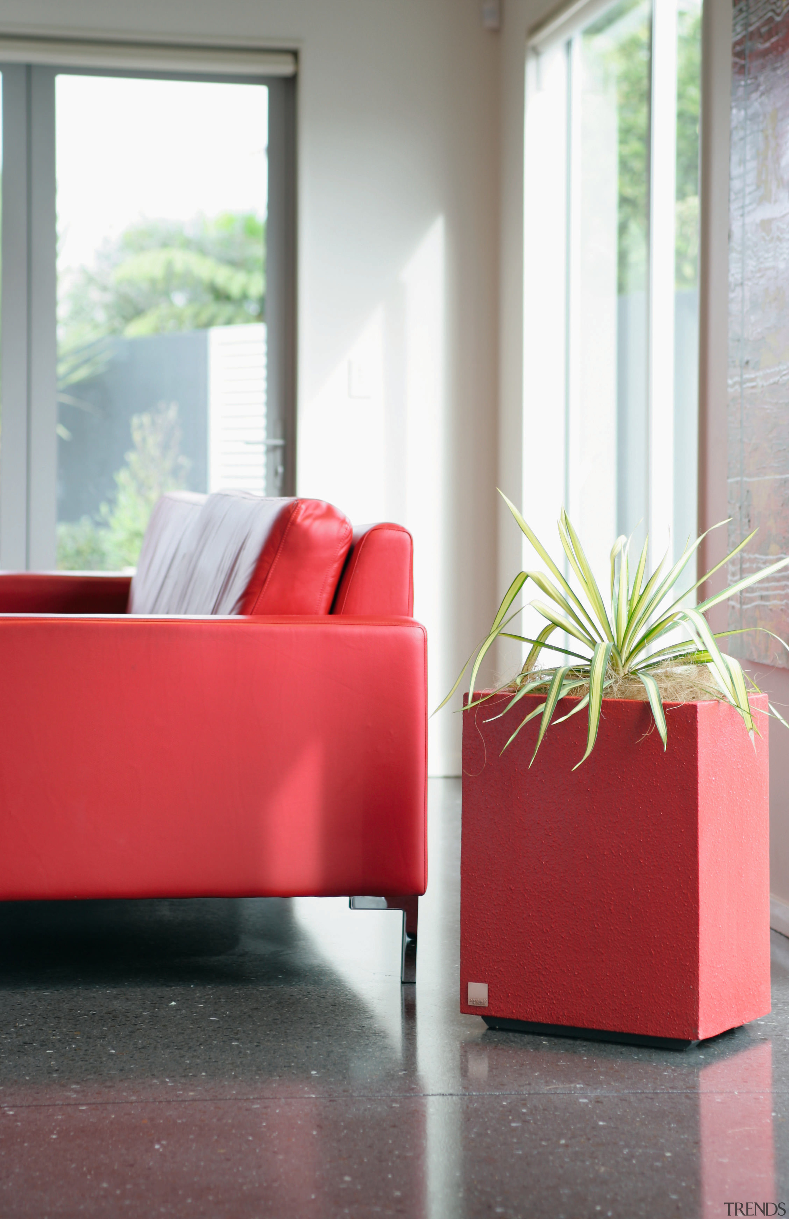 A view of some planters by Bentleigh By chair, couch, floor, flooring, furniture, hardwood, home, interior design, living room, product design, table, window, white, red