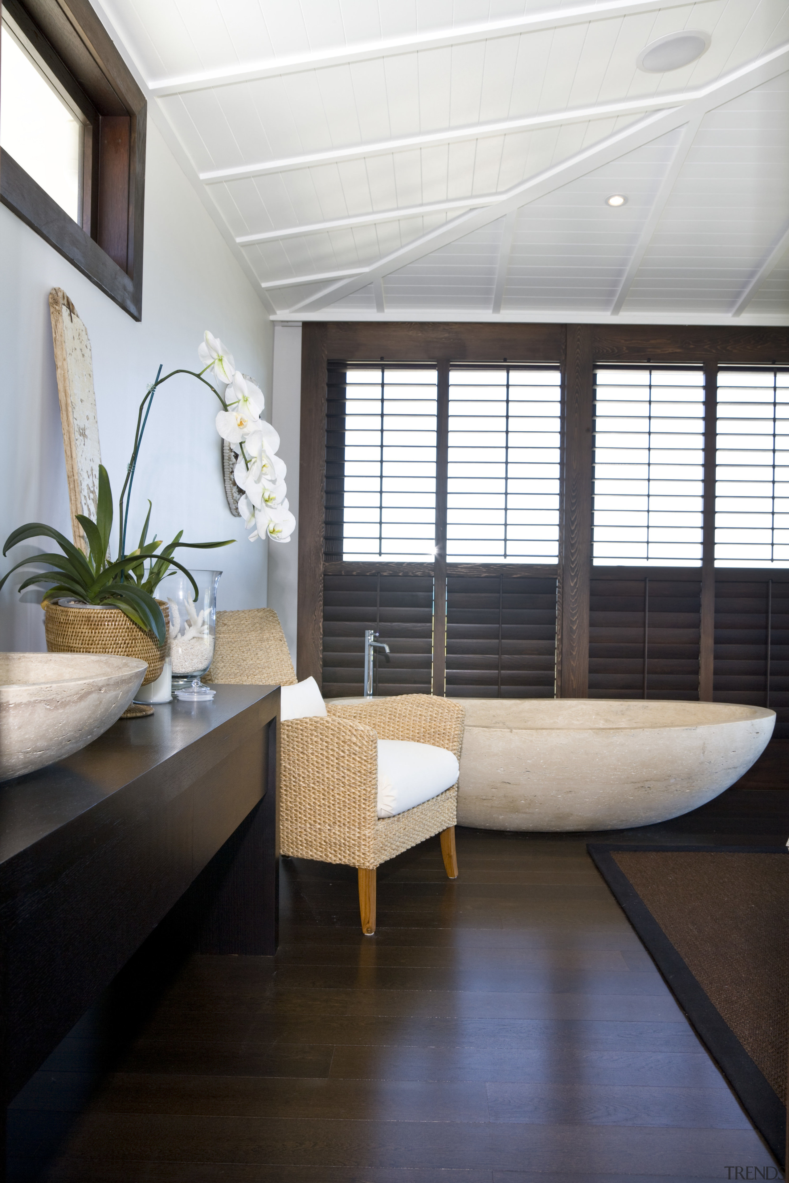 View of stone tub which is in plain architecture, ceiling, daylighting, floor, flooring, house, interior design, living room, room, window, wood, white, black