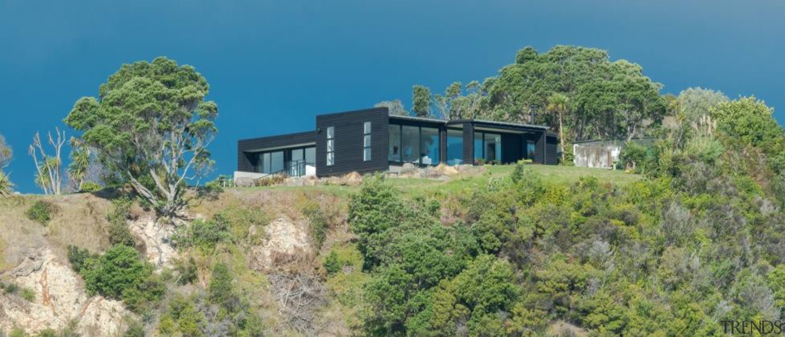 Beautifully designed coastal house by Design House Architecture architecture, biome, cottage, estate, home, house, land lot, property, real estate, sky, tree, villa, green, teal