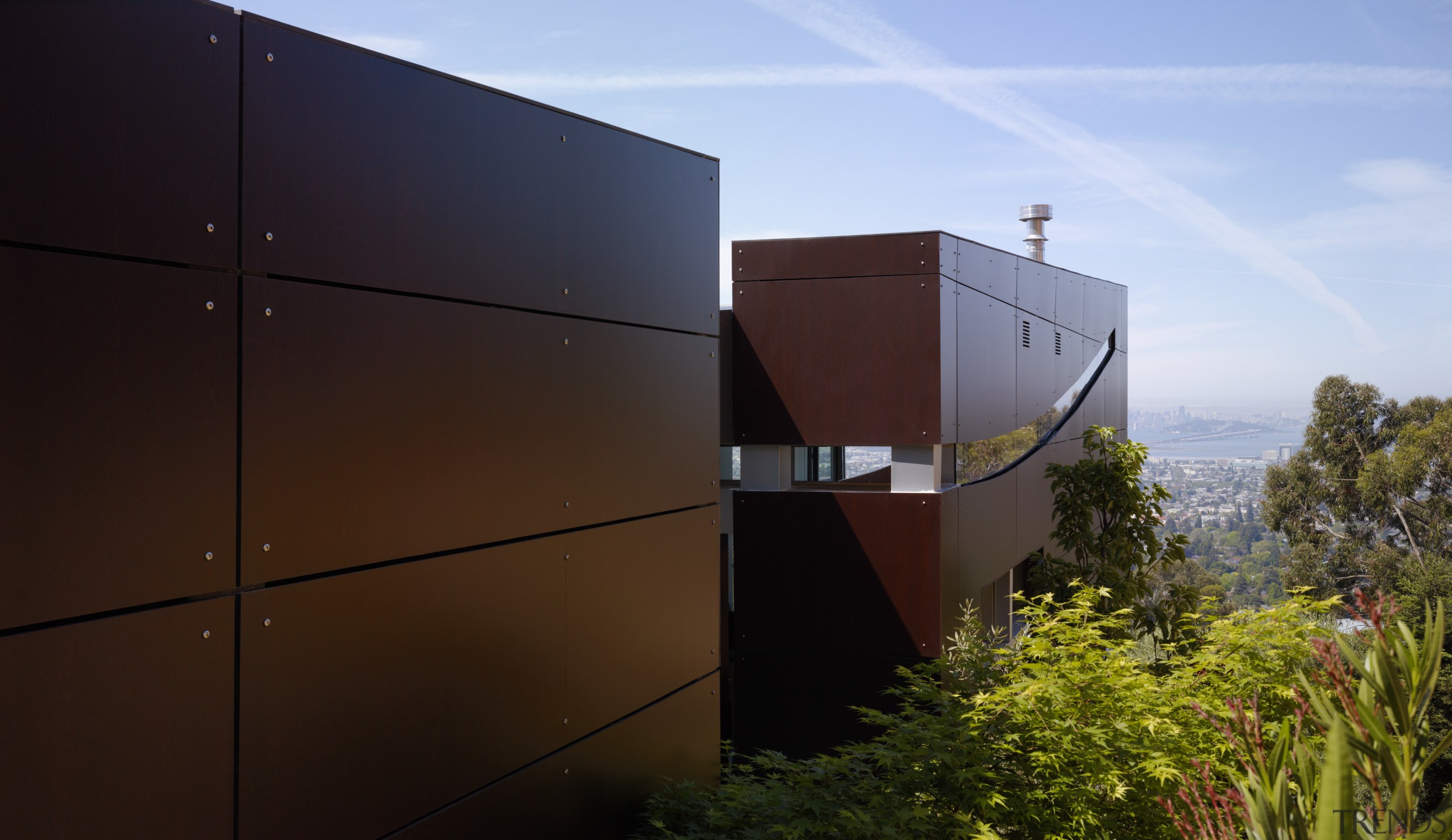 Exterior view of contemporary home with TRESPA siding, architecture, facade, home, house, roof, sky, brown, black