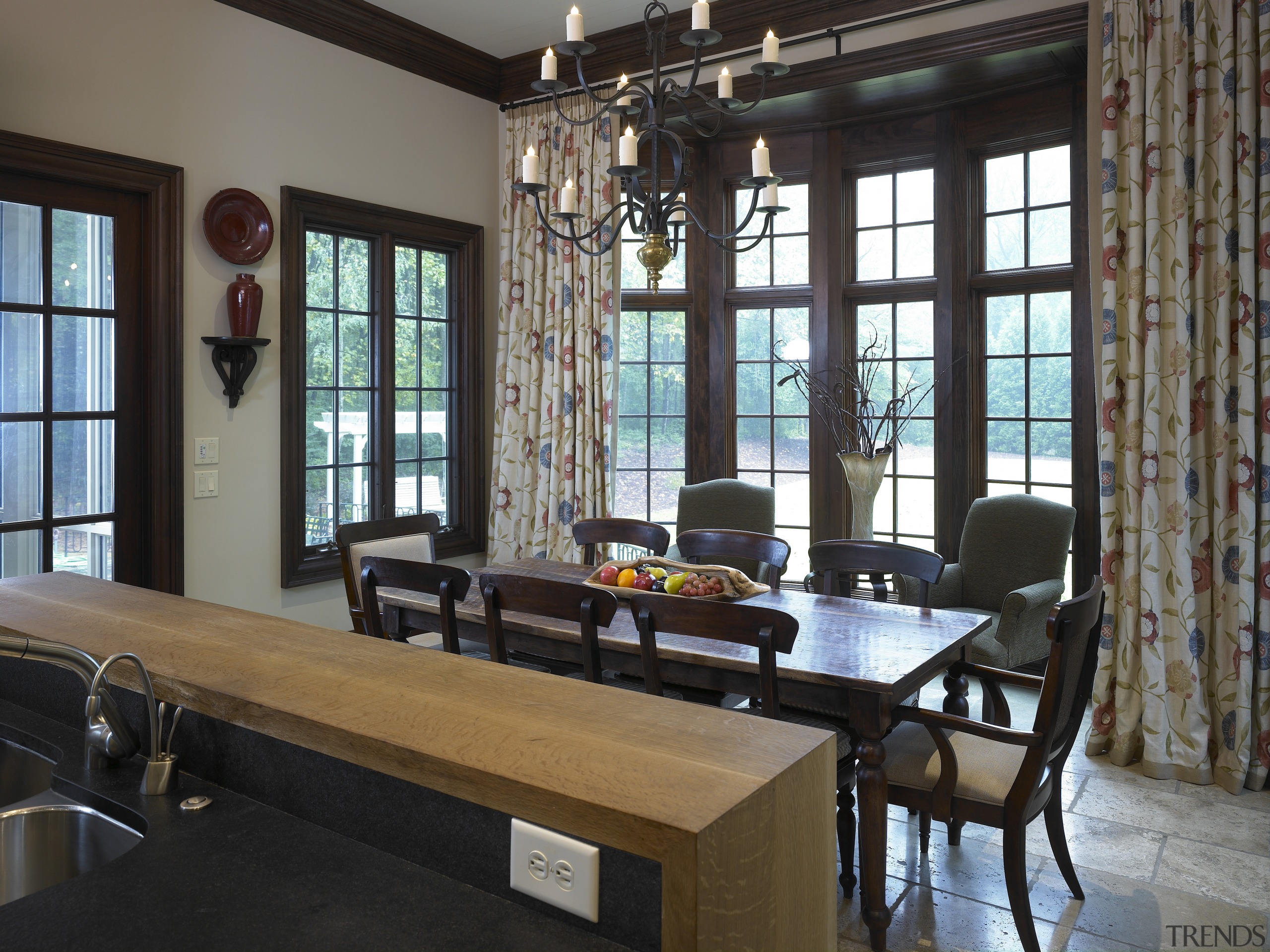 view of kitchen and dining area which was dining room, furniture, interior design, living room, real estate, room, table, window, black