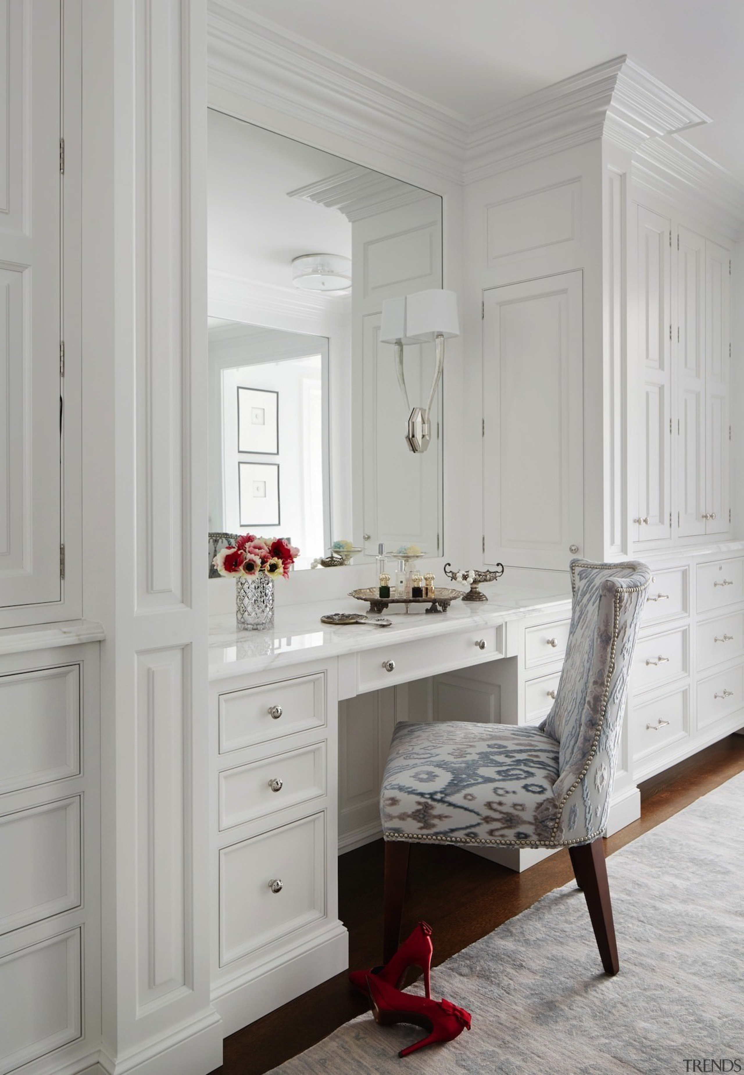 This vanity has easy access to draws and cabinetry, chest of drawers, floor, flooring, furniture, home, interior design, room, table, wall, window, gray