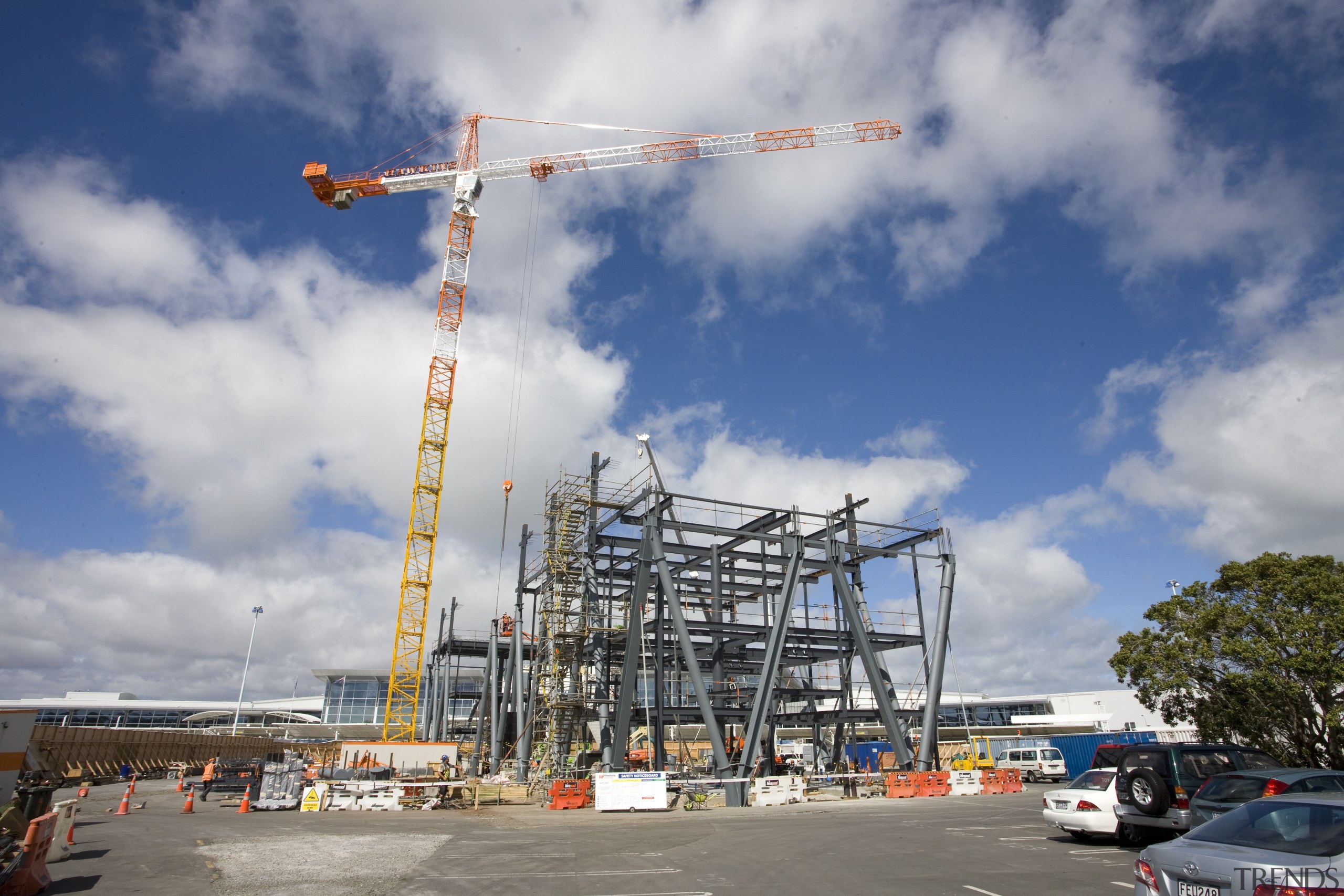 Novotel Auckland Airport by Gorge Grant Engineering. cloud, construction, construction equipment, crane, sky, gray