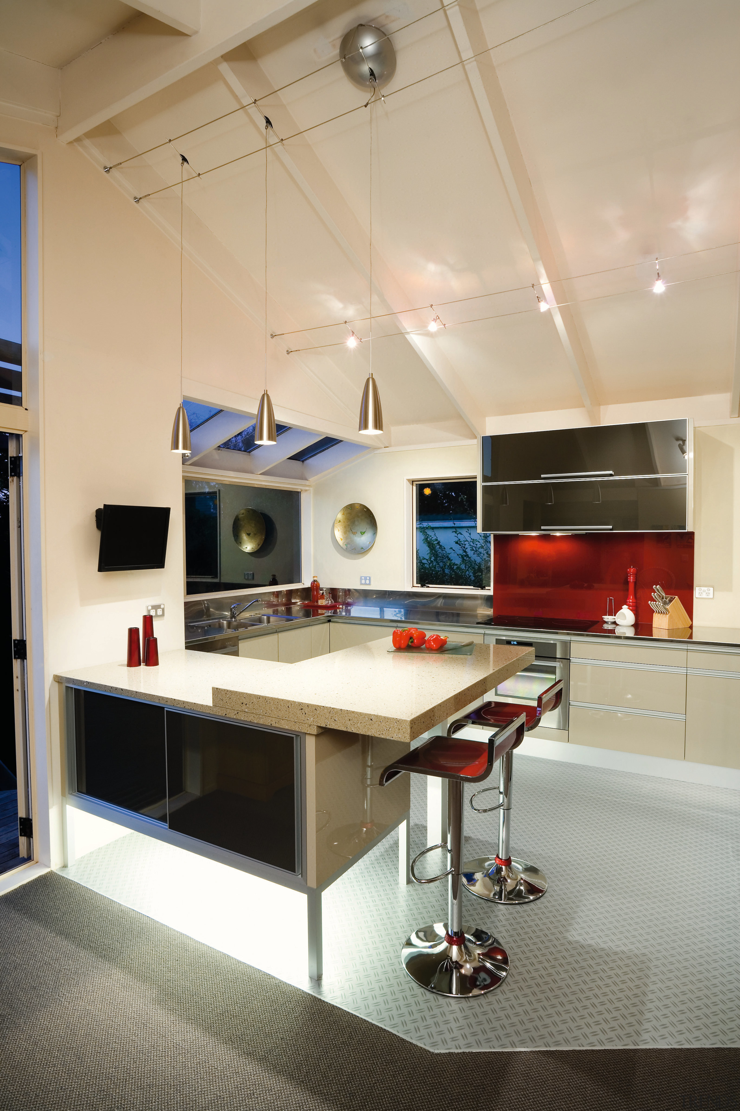 A view of this kitchen featuring quarell and countertop, interior design, kitchen, room, orange