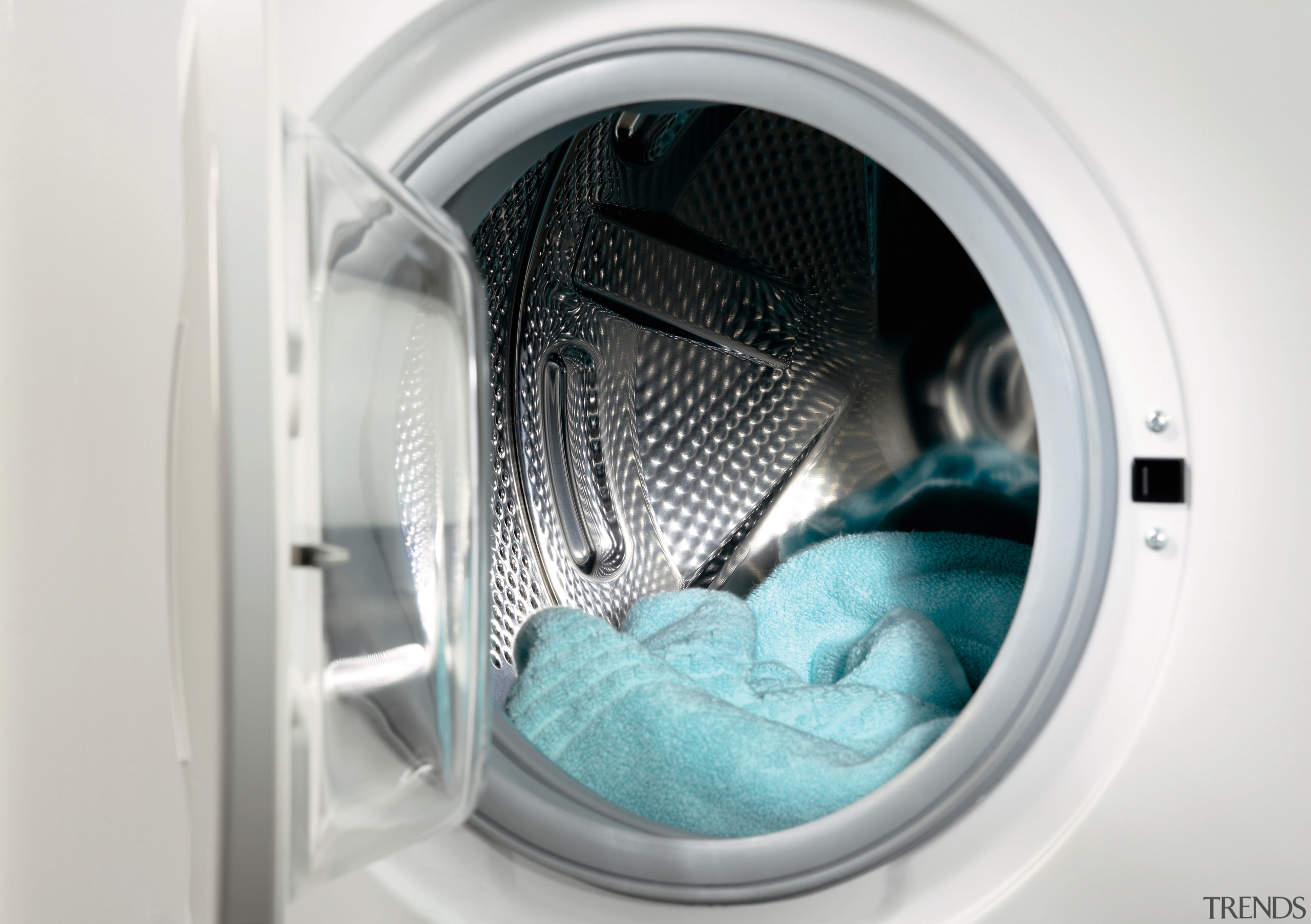 A view of a dryer. - A view clothes dryer, home appliance, laundry, major appliance, medical equipment, product, product design, washing machine, white