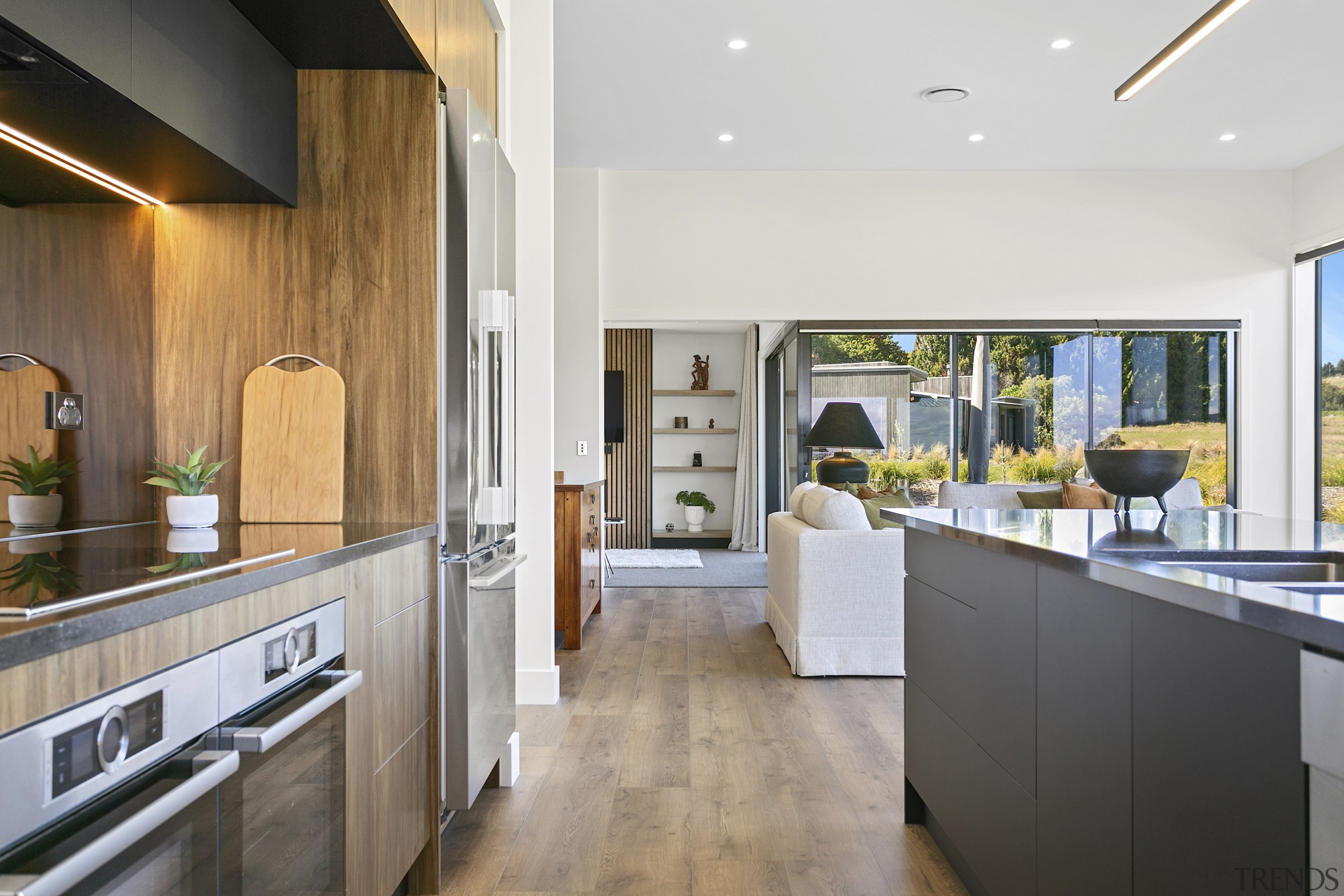 Black and wood make ideal cabinet finish companions. 