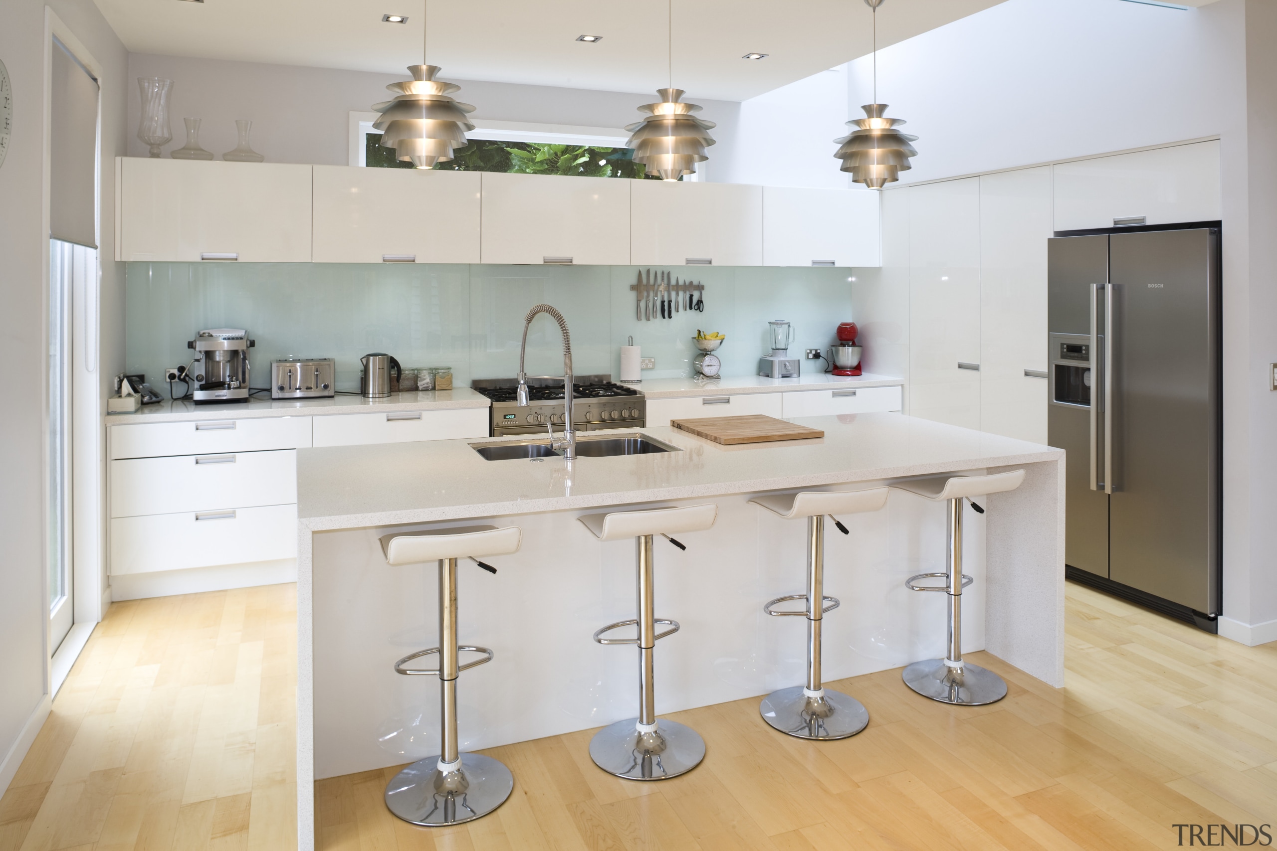View of a kitchen in a house designed countertop, cuisine classique, interior design, kitchen, real estate, room, gray