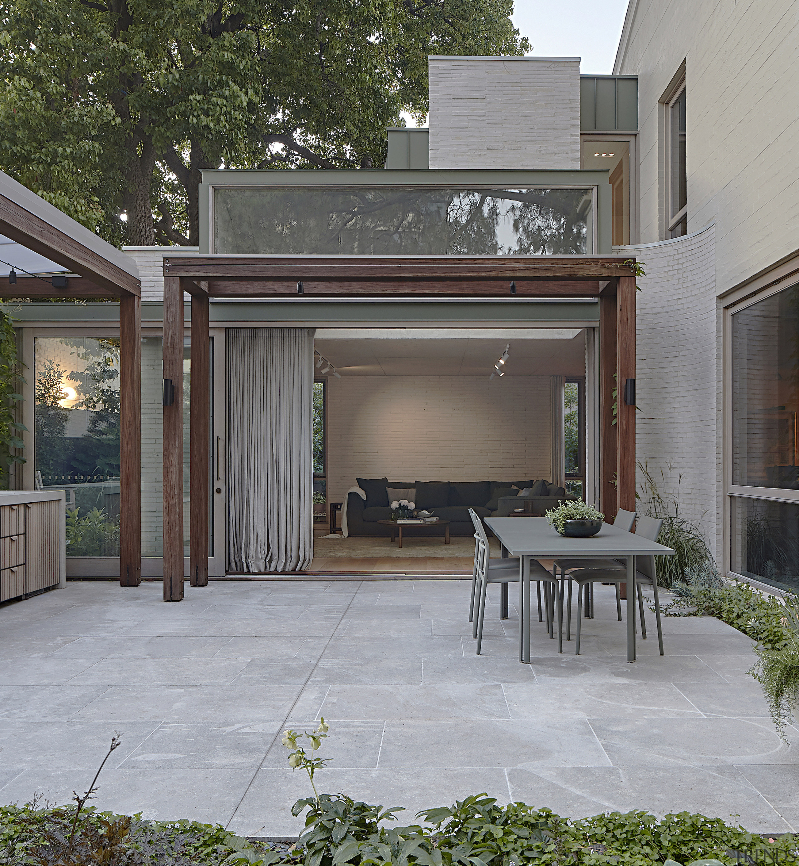 The central courtyard created by the L-shaped plan. 