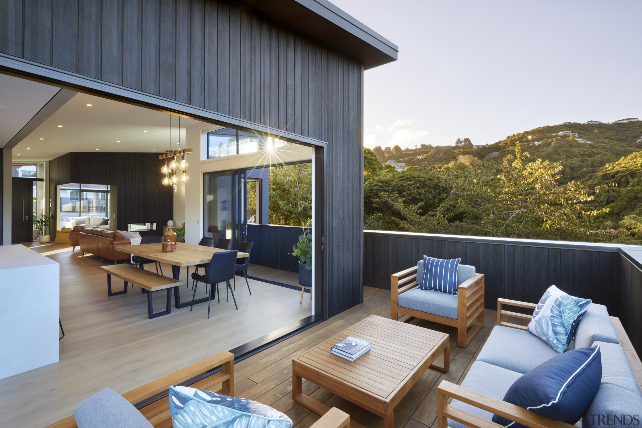 The home opens up to the outdoor room 