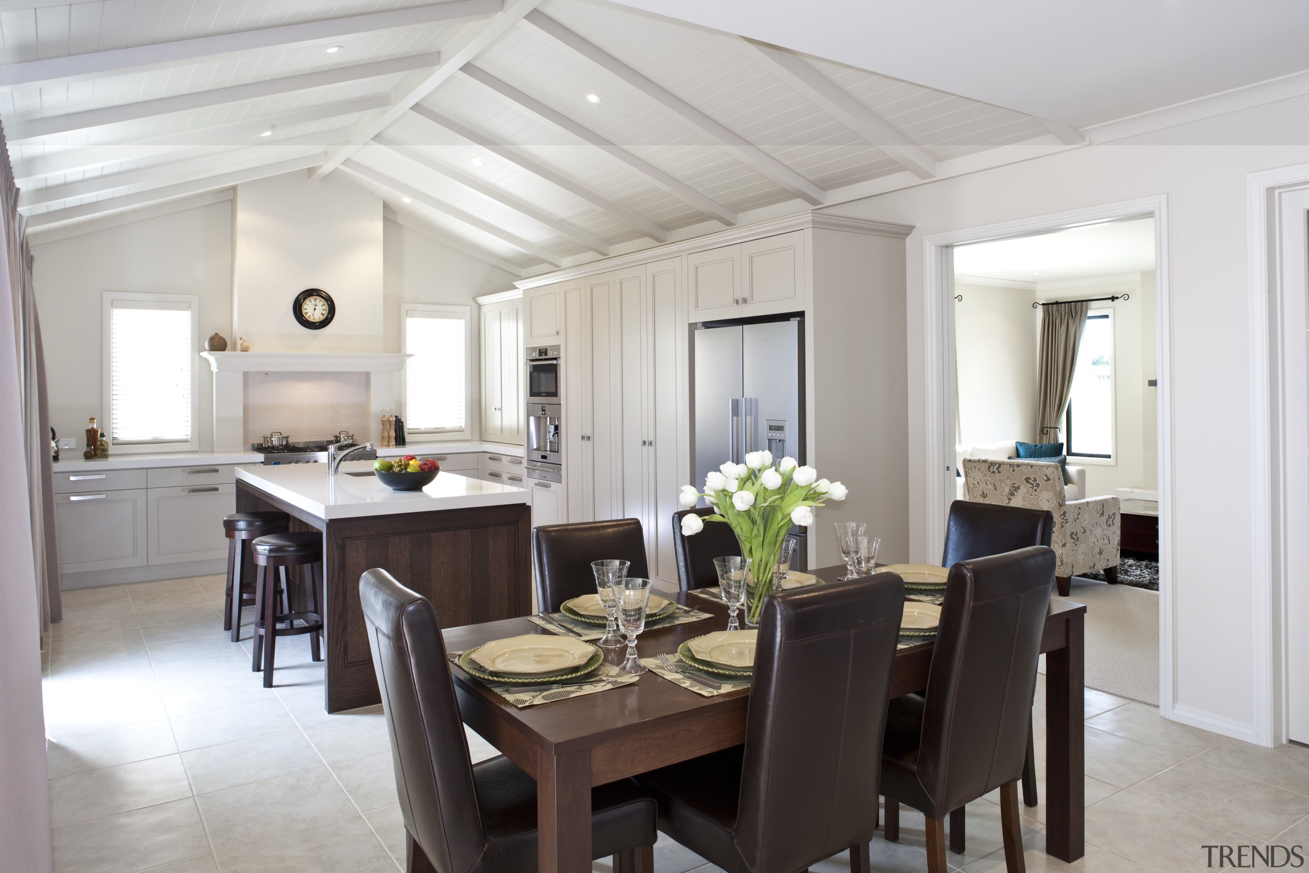 View of kitchen and dining area featuring floor-to-ceiling ceiling, dining room, interior design, kitchen, property, real estate, room, gray, white